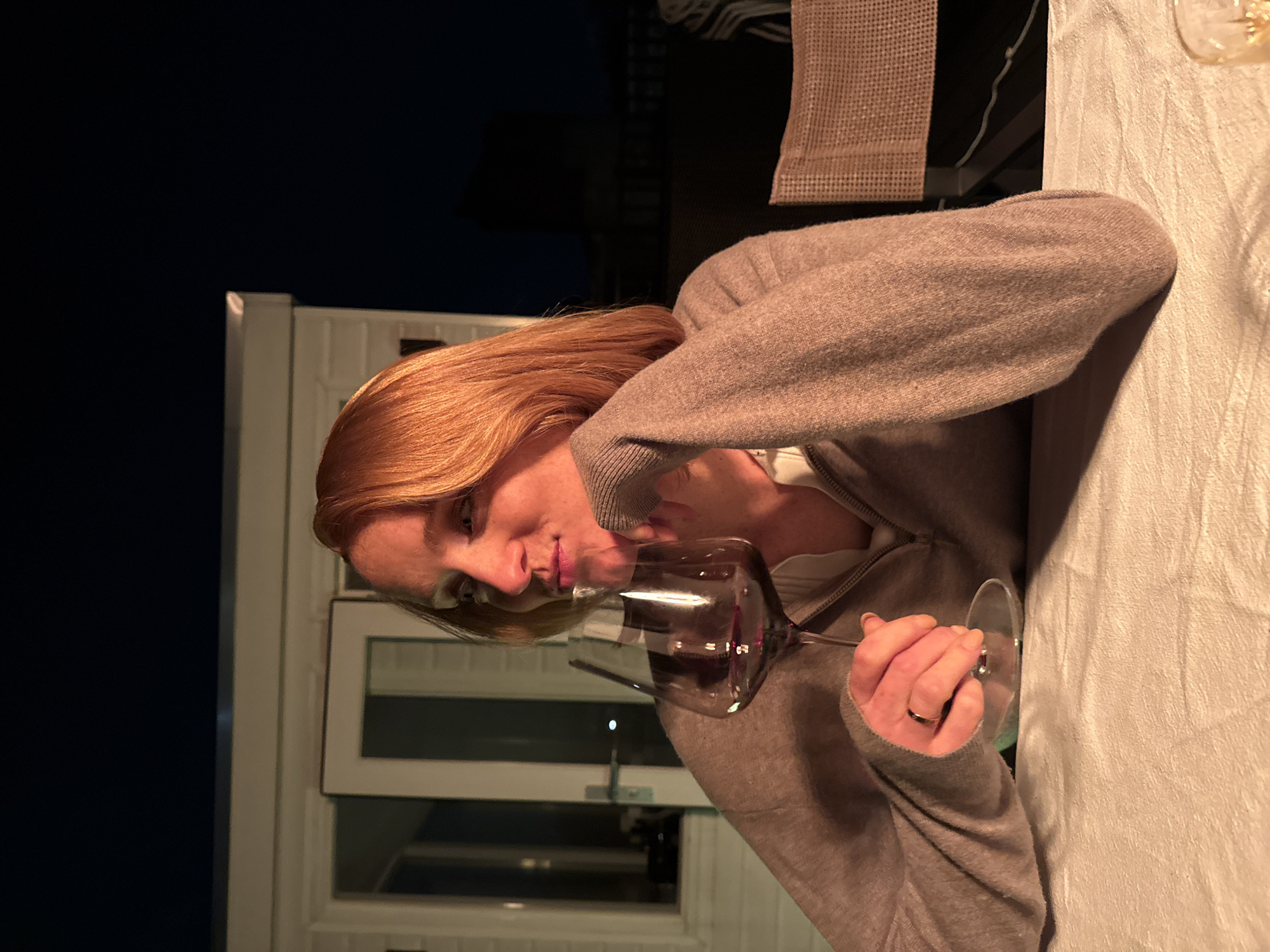 Couple enjoys romantic evening dinner with wine in Amsterdam