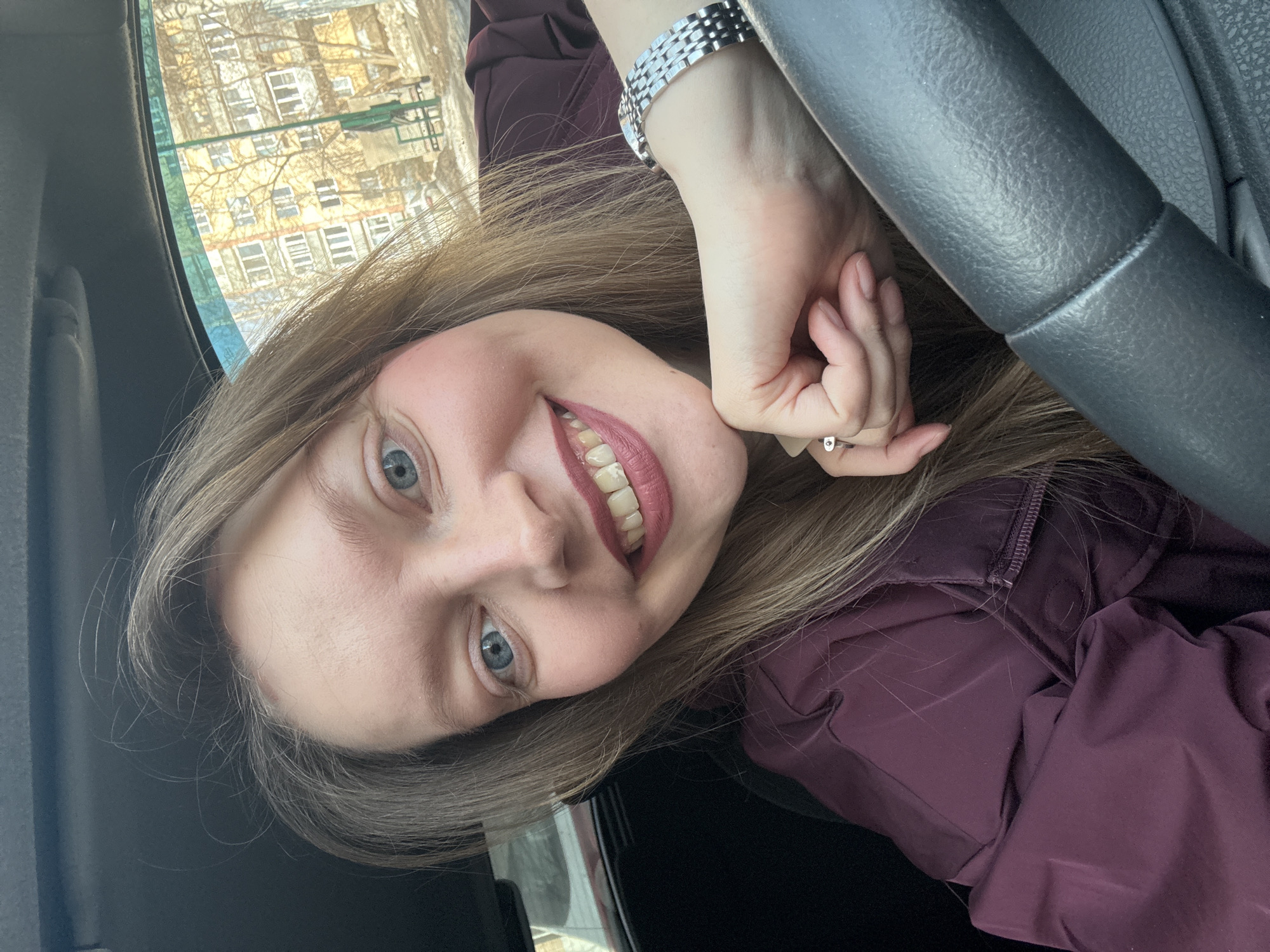 Woman takes selfie in driver's seat in Izhevsk