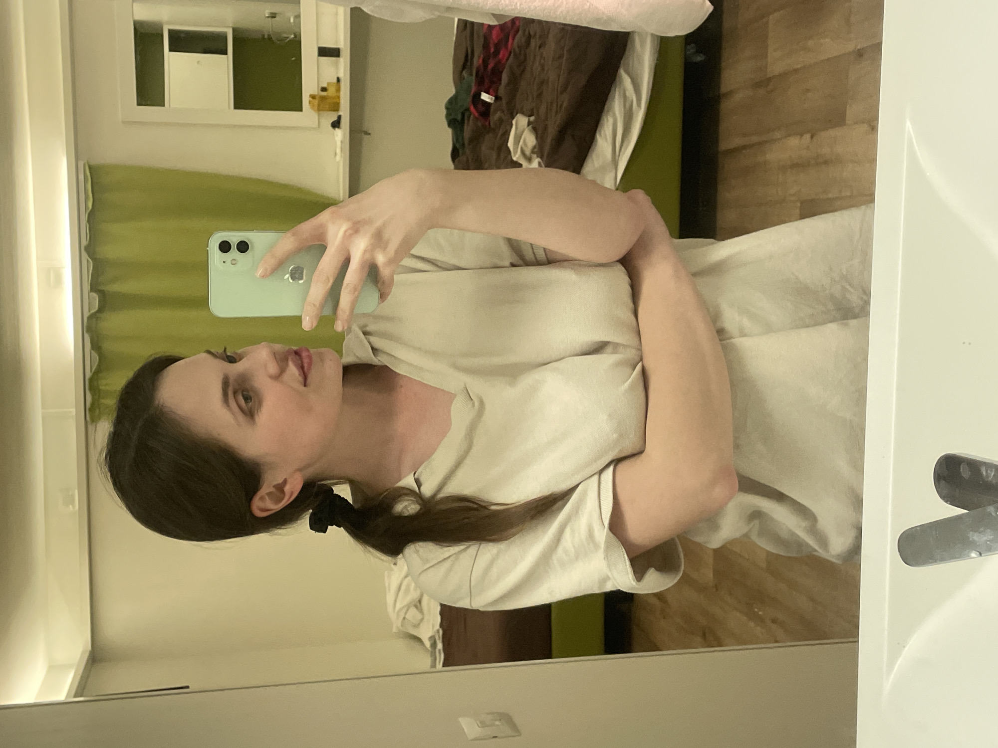 Woman takes mirror selfies in Venice hotel bathroom