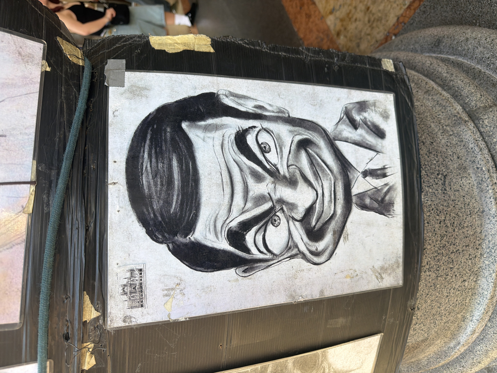Rooftop gathering with art viewing documented in Milan