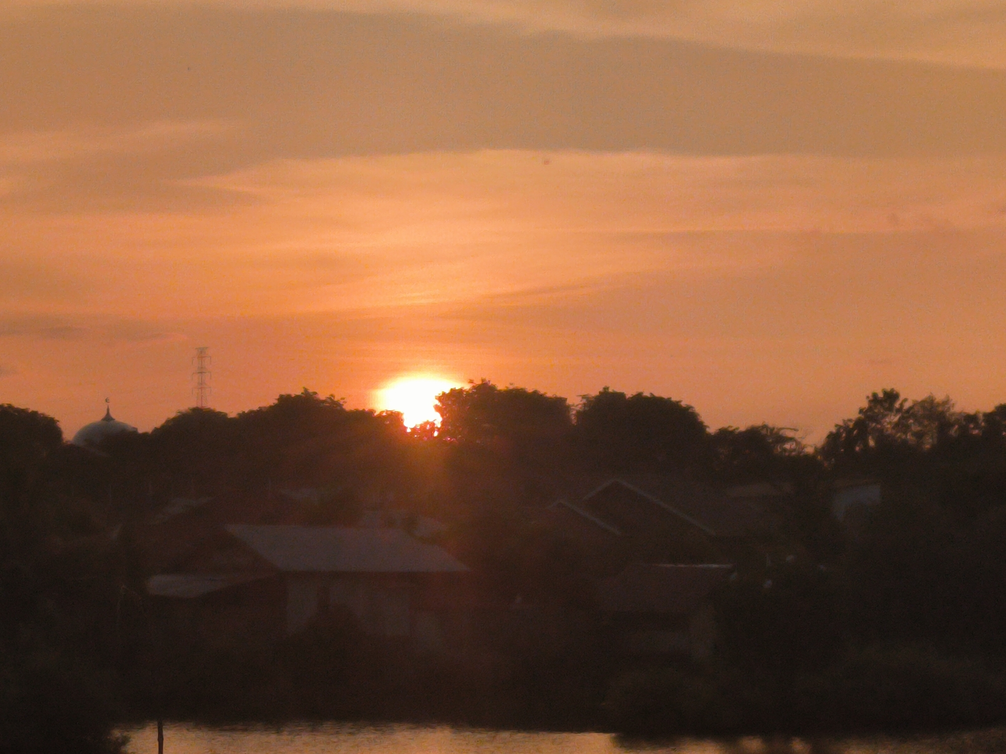 Morning scenes captured in Lhokseumawe: sunrise and sports gathering