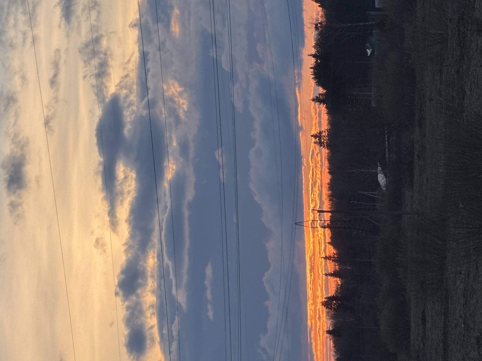 Dramatic sunset and crescent moon observed in Chernushka, Russia