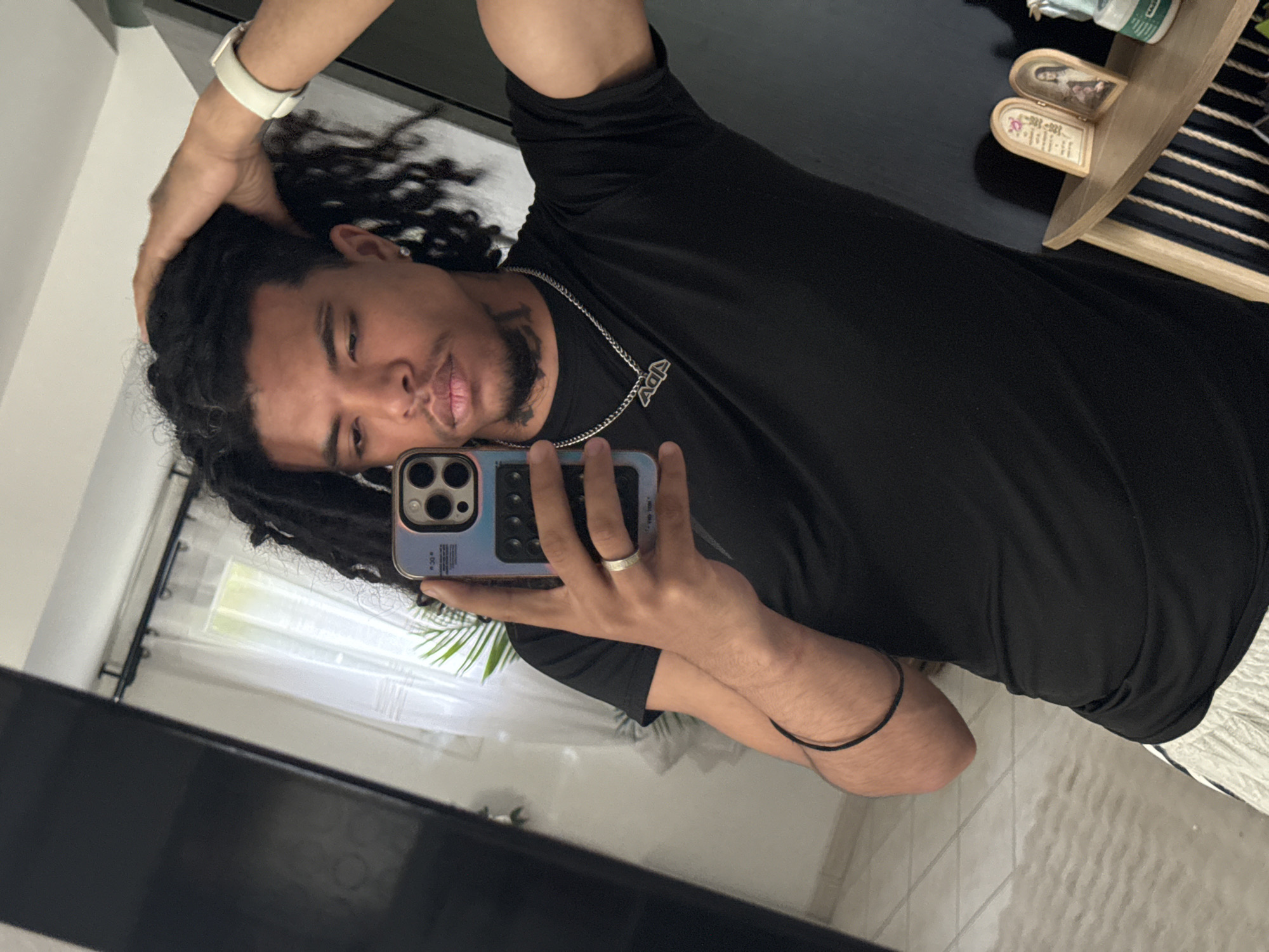 Young man takes mirror selfies in Beuvillers residence