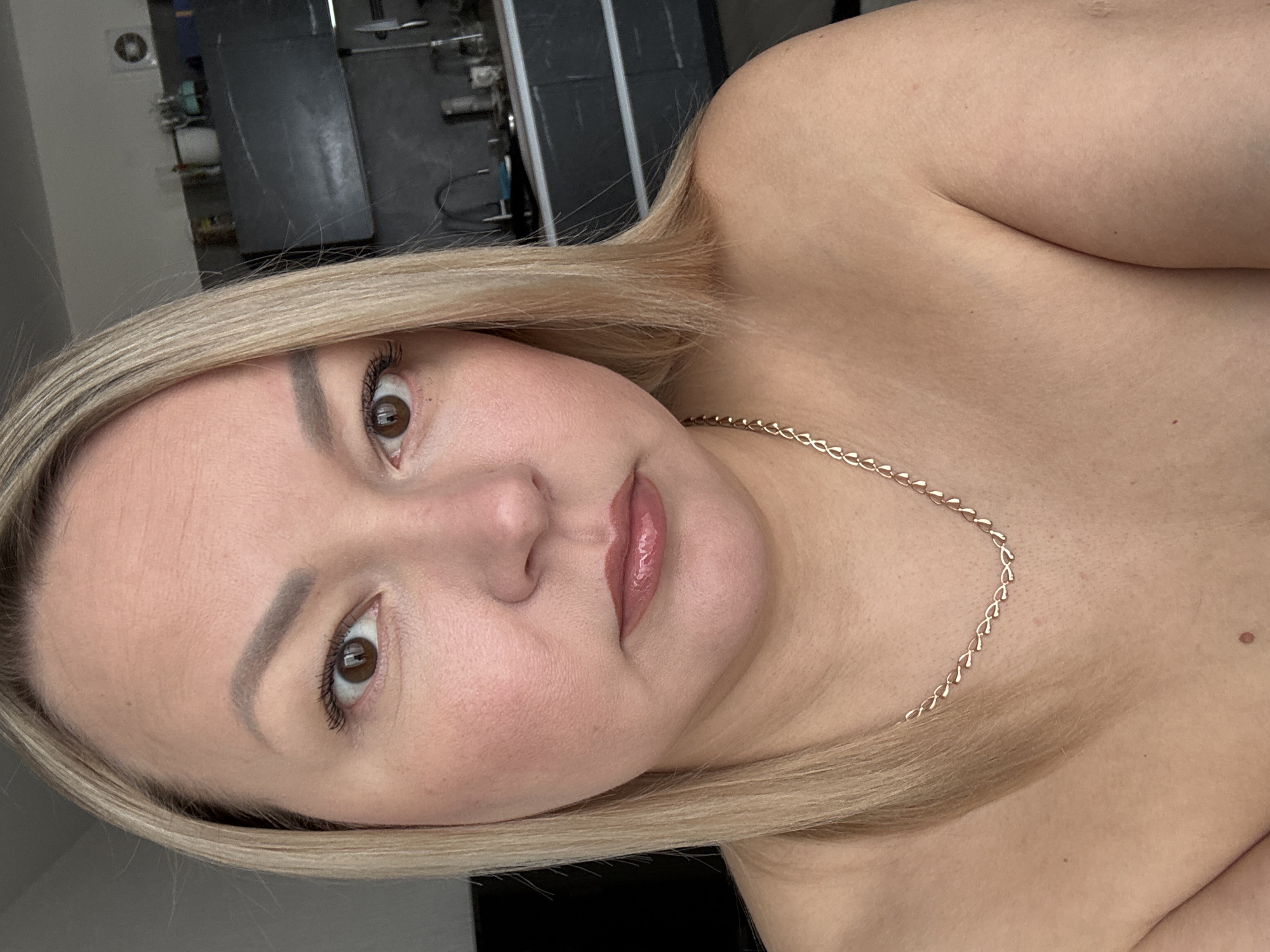Woman takes multiple selfies in apartment in Izhevsk