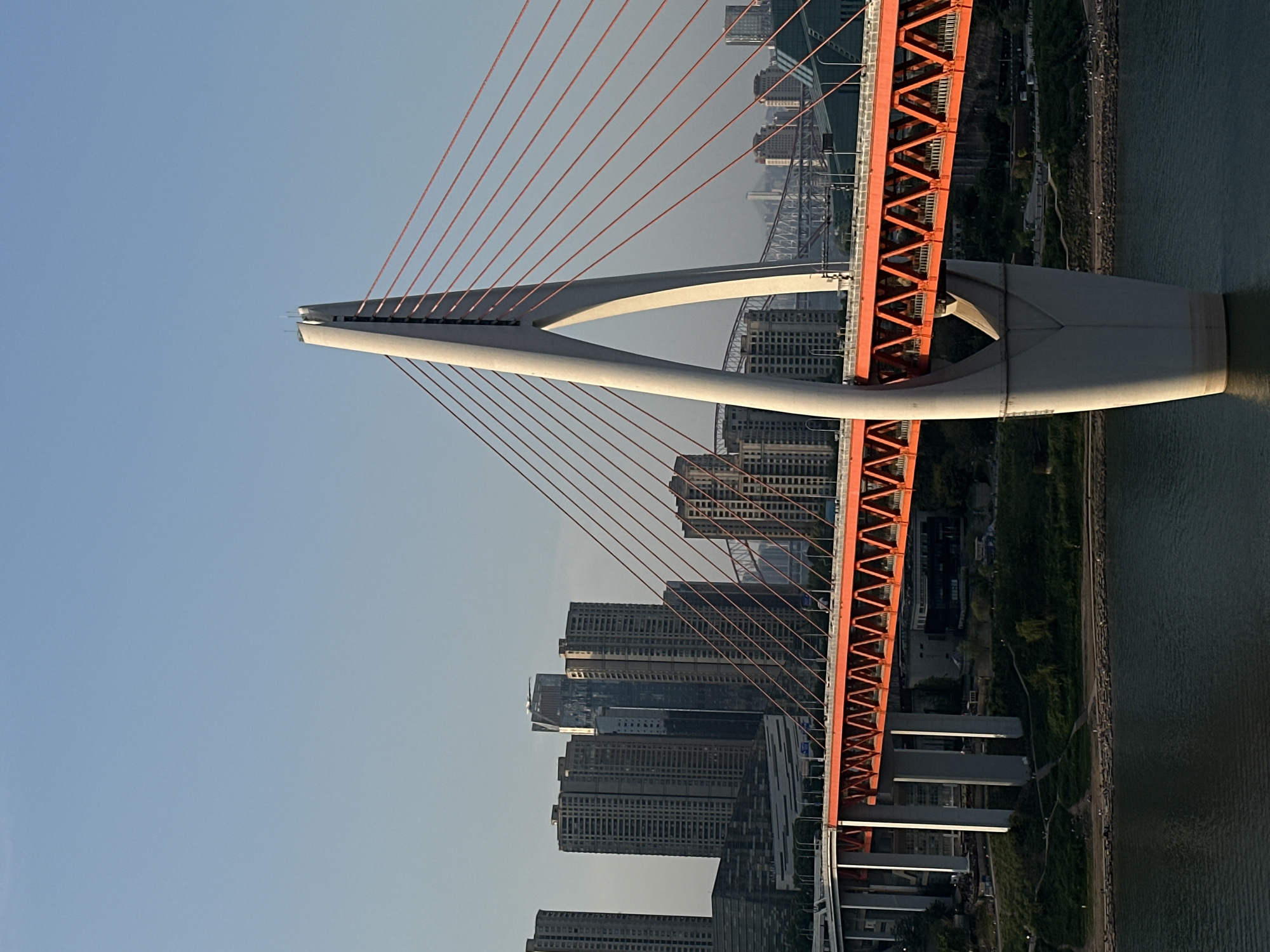 Tourist documents Chongqing landmarks during morning walkabout in Yuzhong District