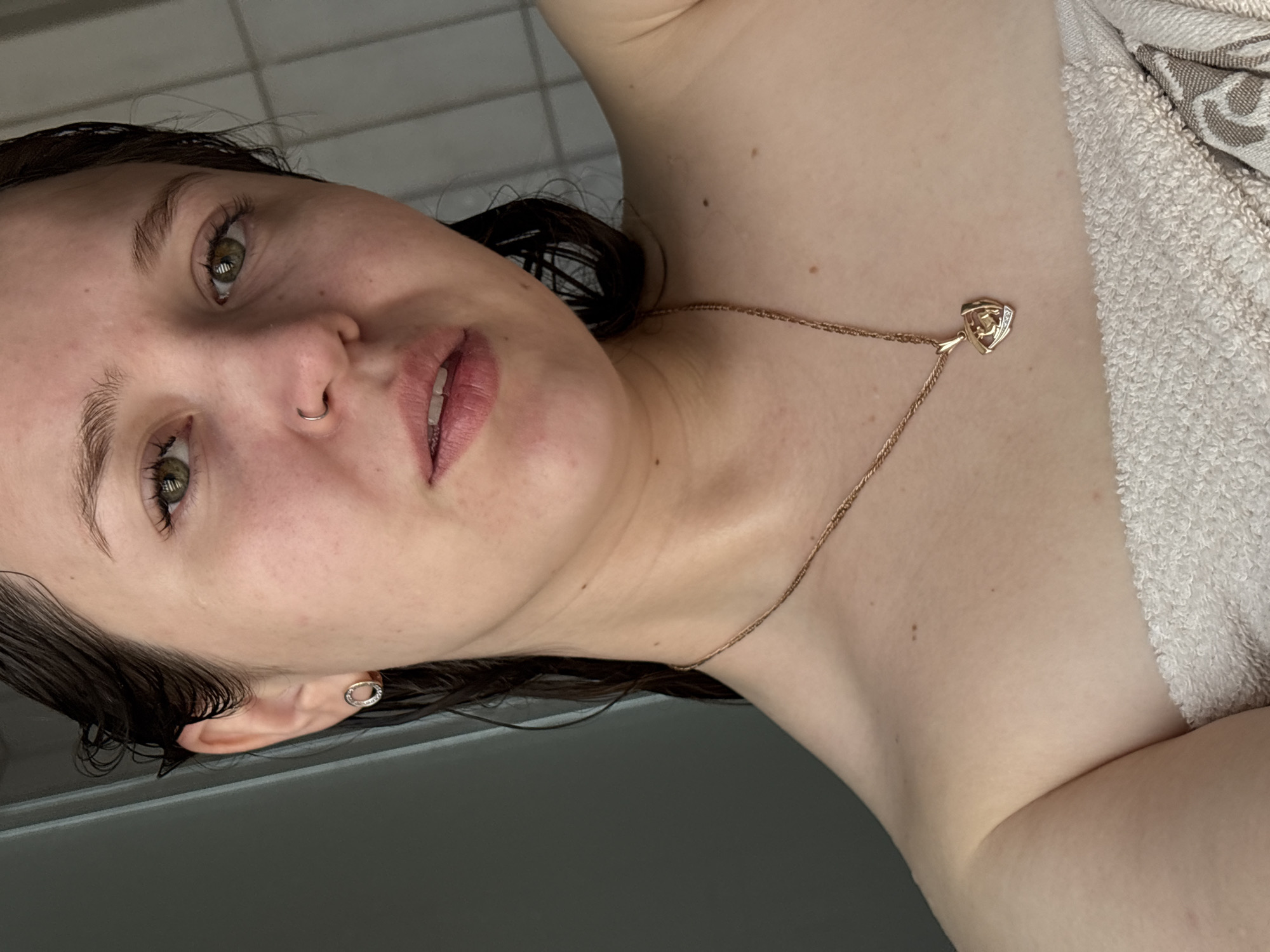 Woman photographed in casual morning portraits with cat in Izhevsk