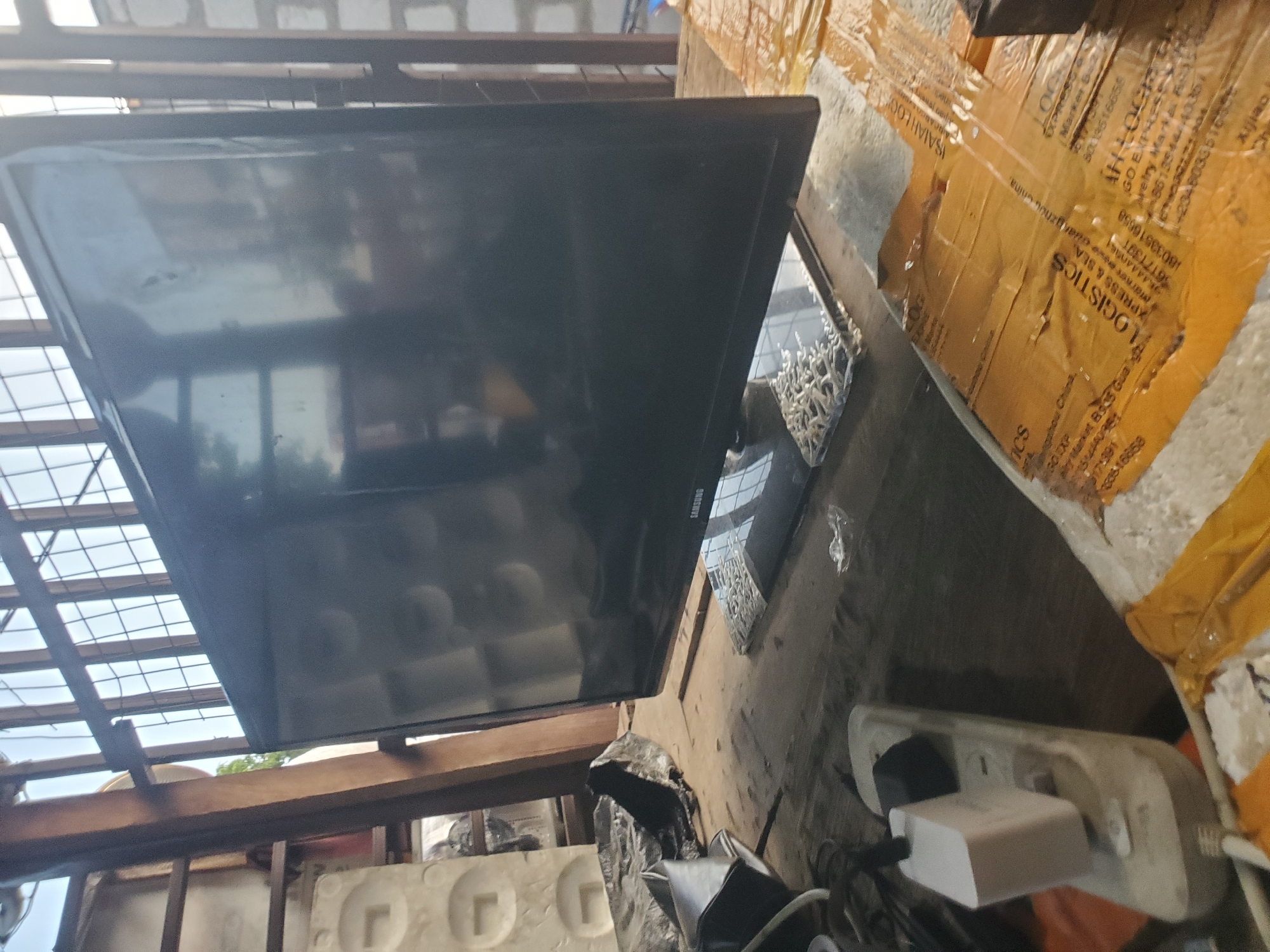 TV delivery and pedestrian activity observed in Adankolo, Nigeria