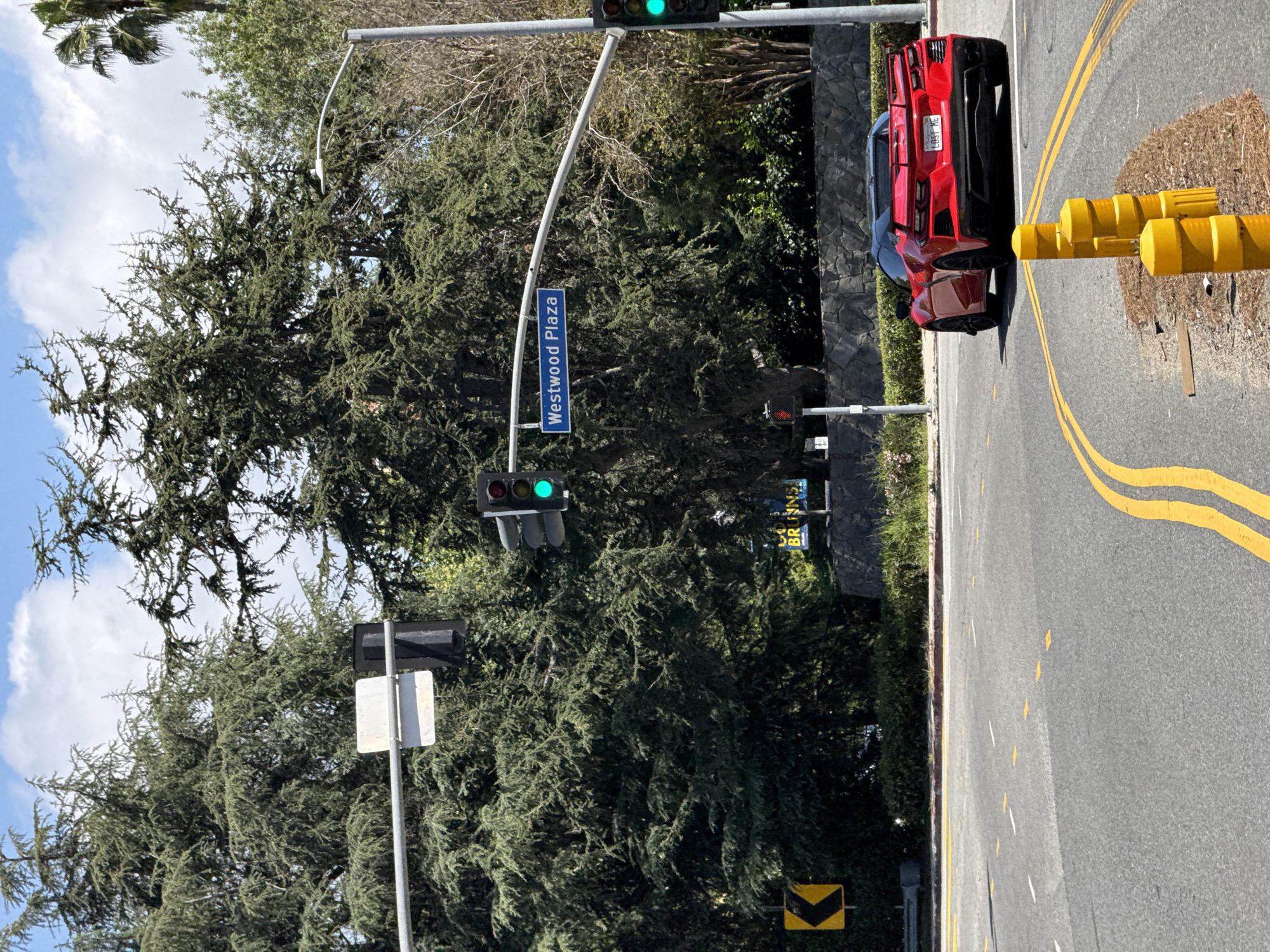 Red Corvette spotted at Westwood Plaza intersection in LA