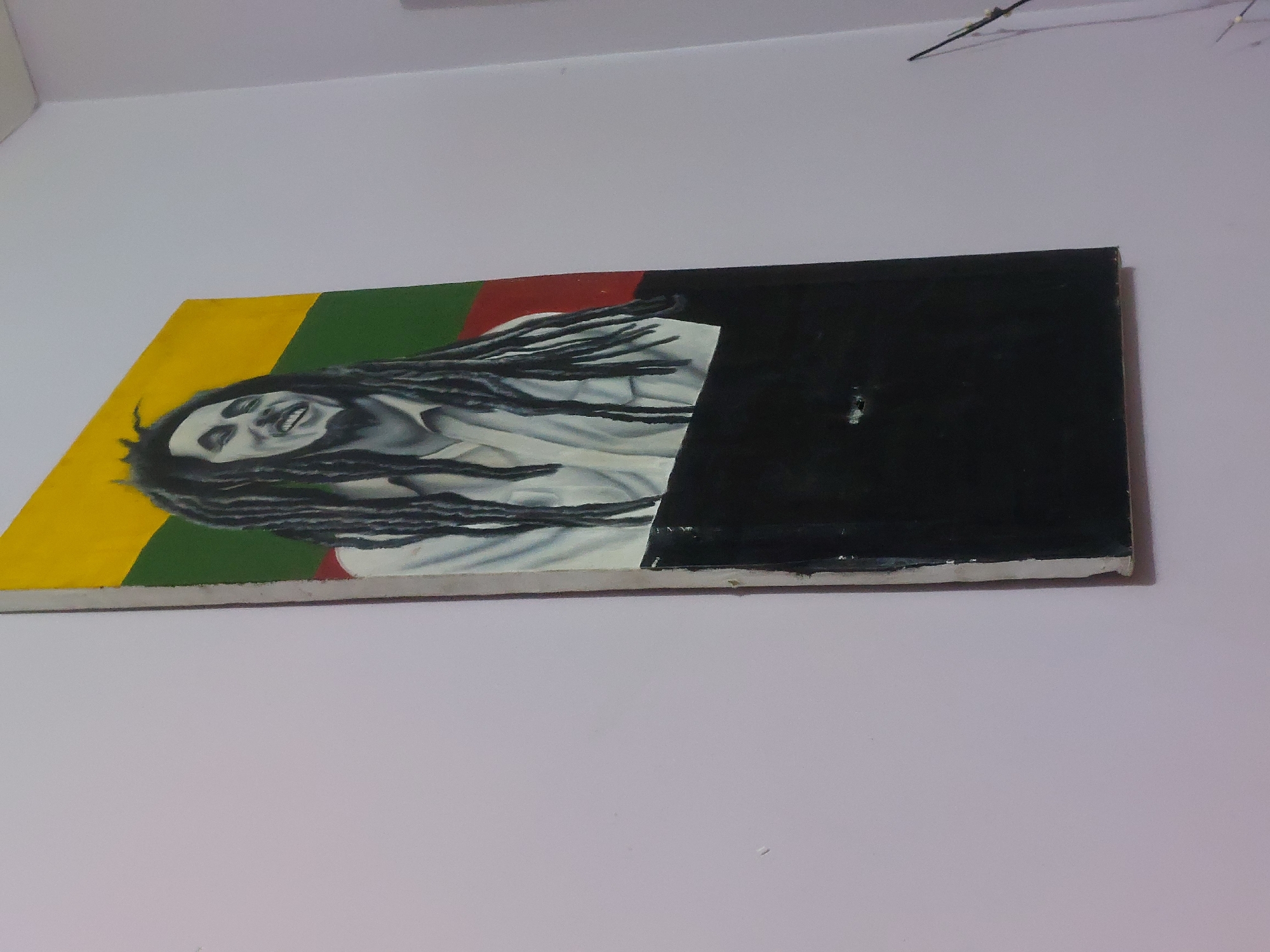 Dar es Salaam scenes: Bob Marley art, child with phone