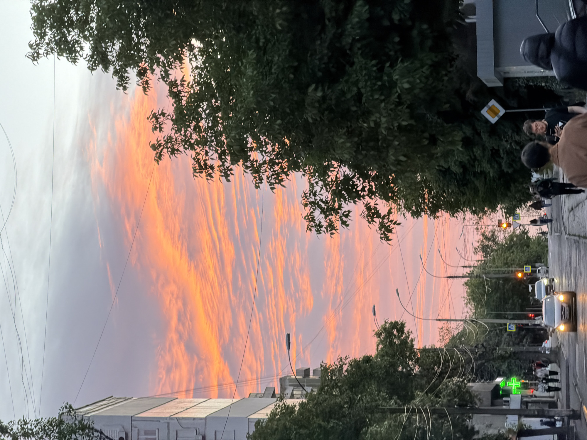 Dramatic sunset lights up Chișinău sky with orange clouds