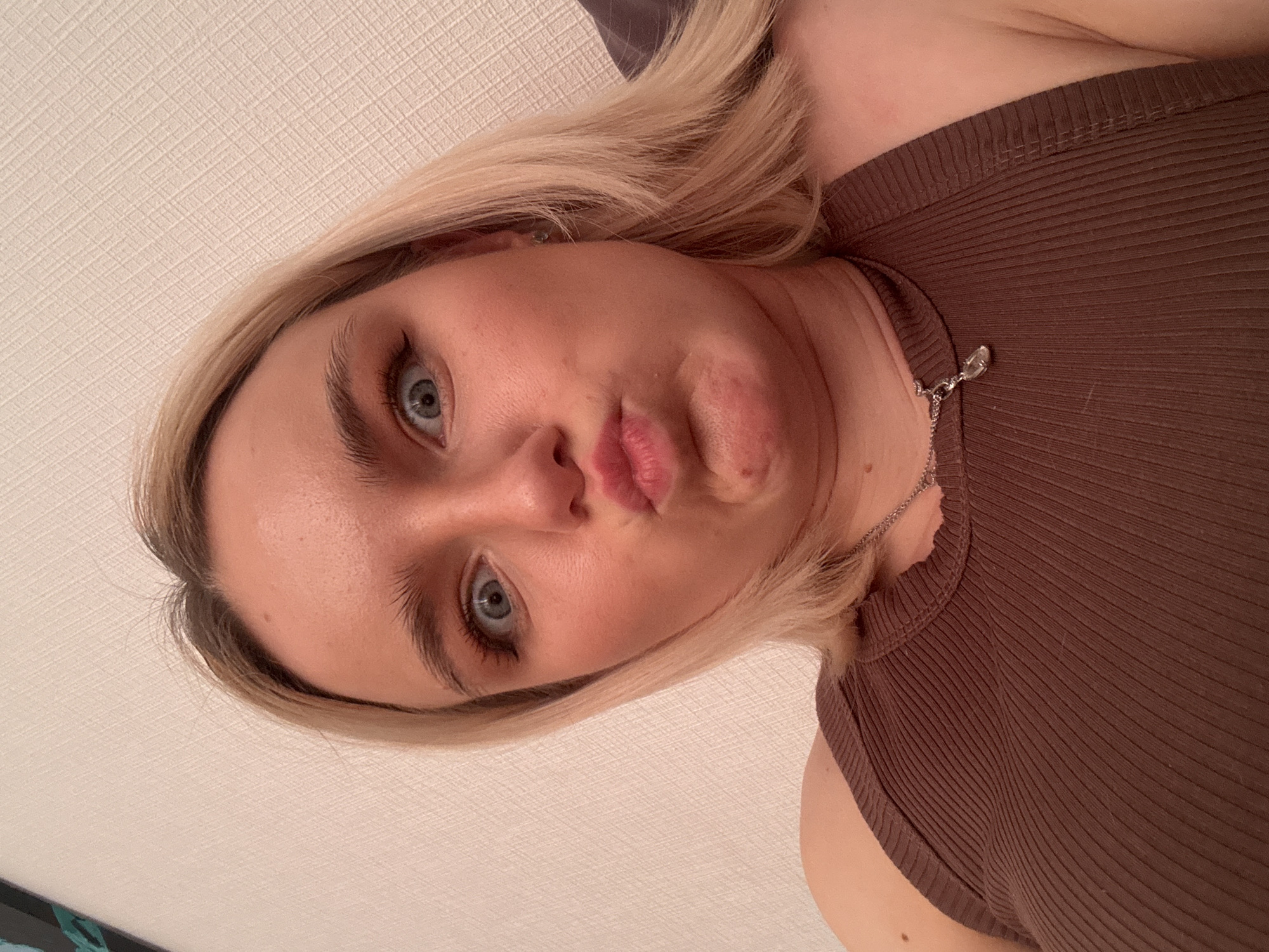Young woman documents evening across Russian locations with selfies