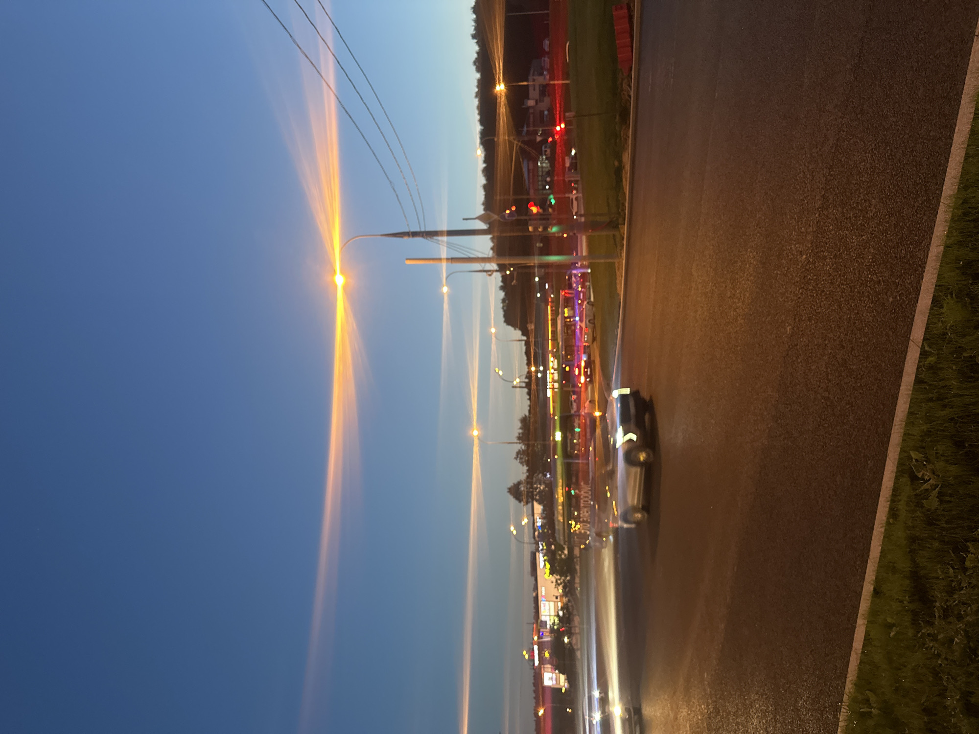 Moscow intersection at dusk, long-exposure light trails