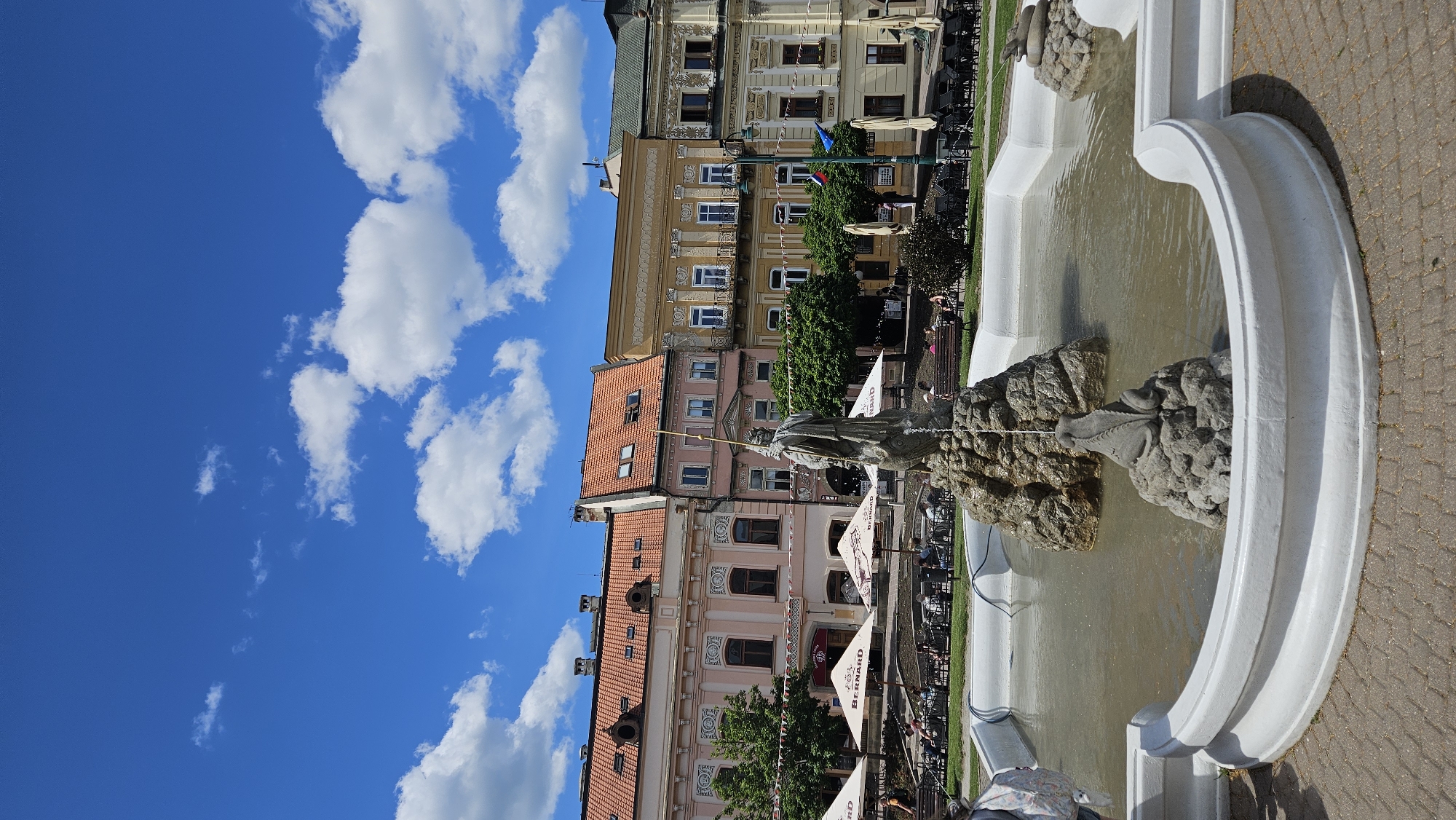 Tourist documents historic Prešov city center landmarks and streets
