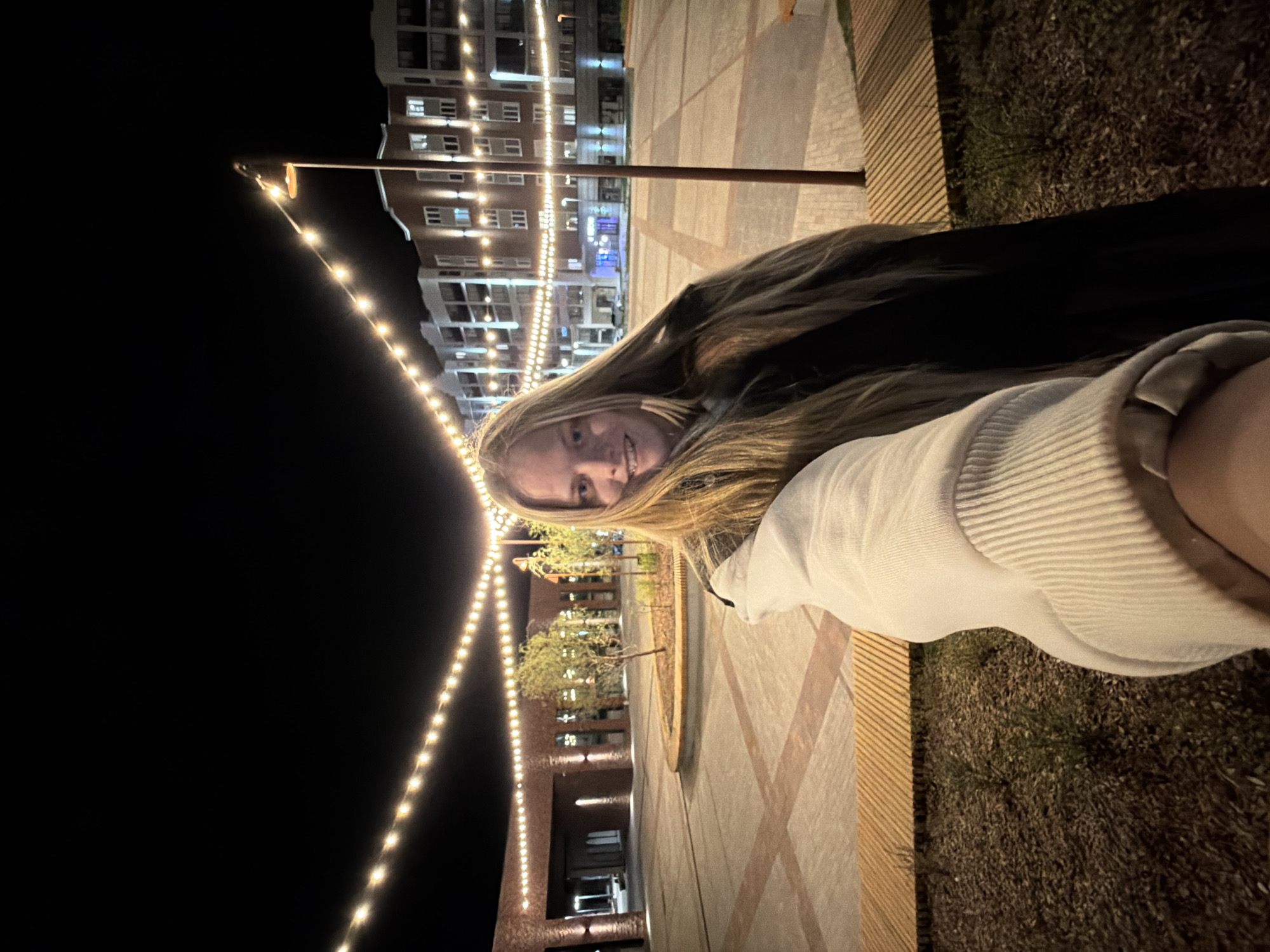 Woman poses for nighttime photos in Izhevsk, Russia