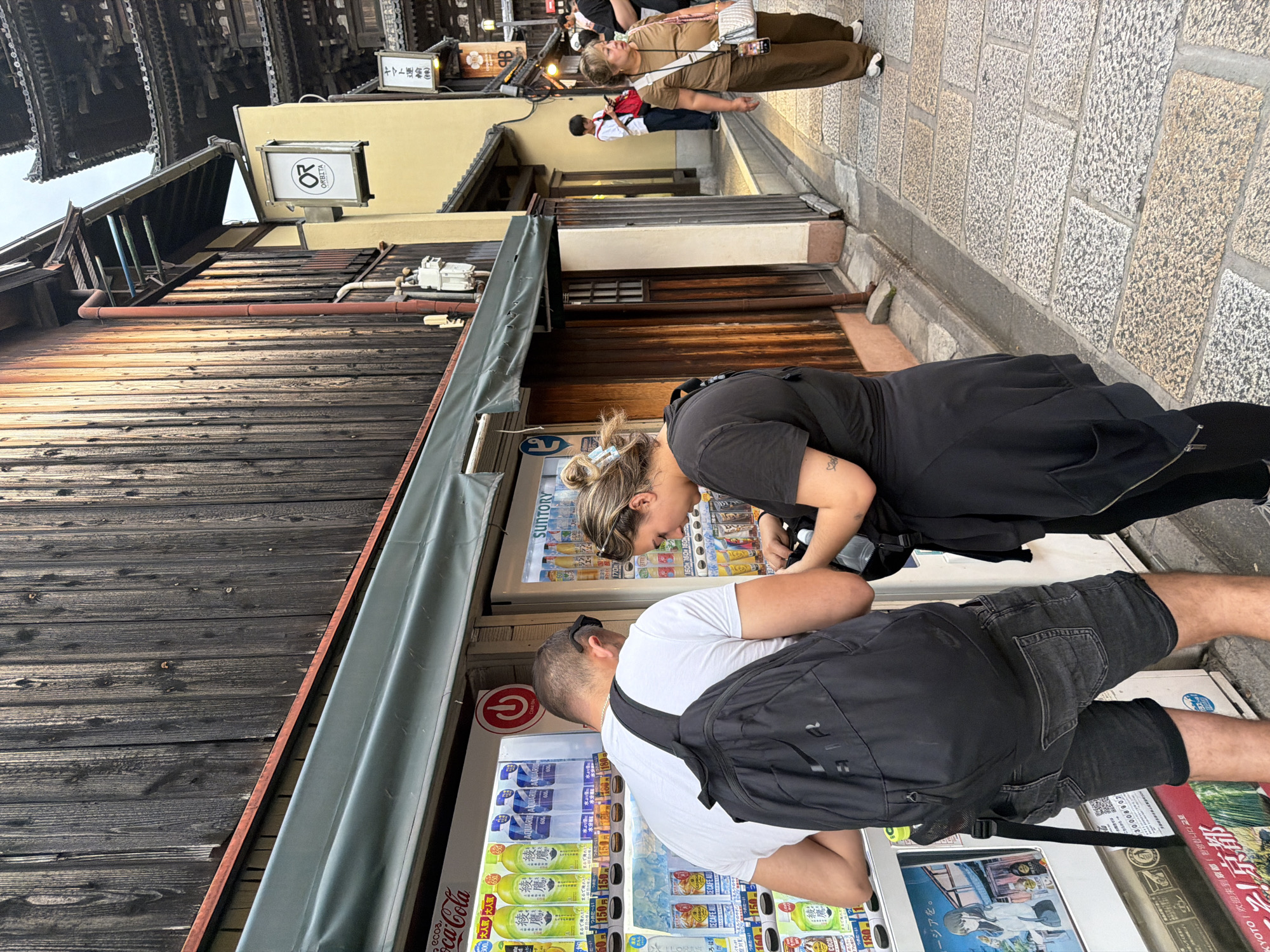 Tourist documents morning walk through historic Kyoto districts