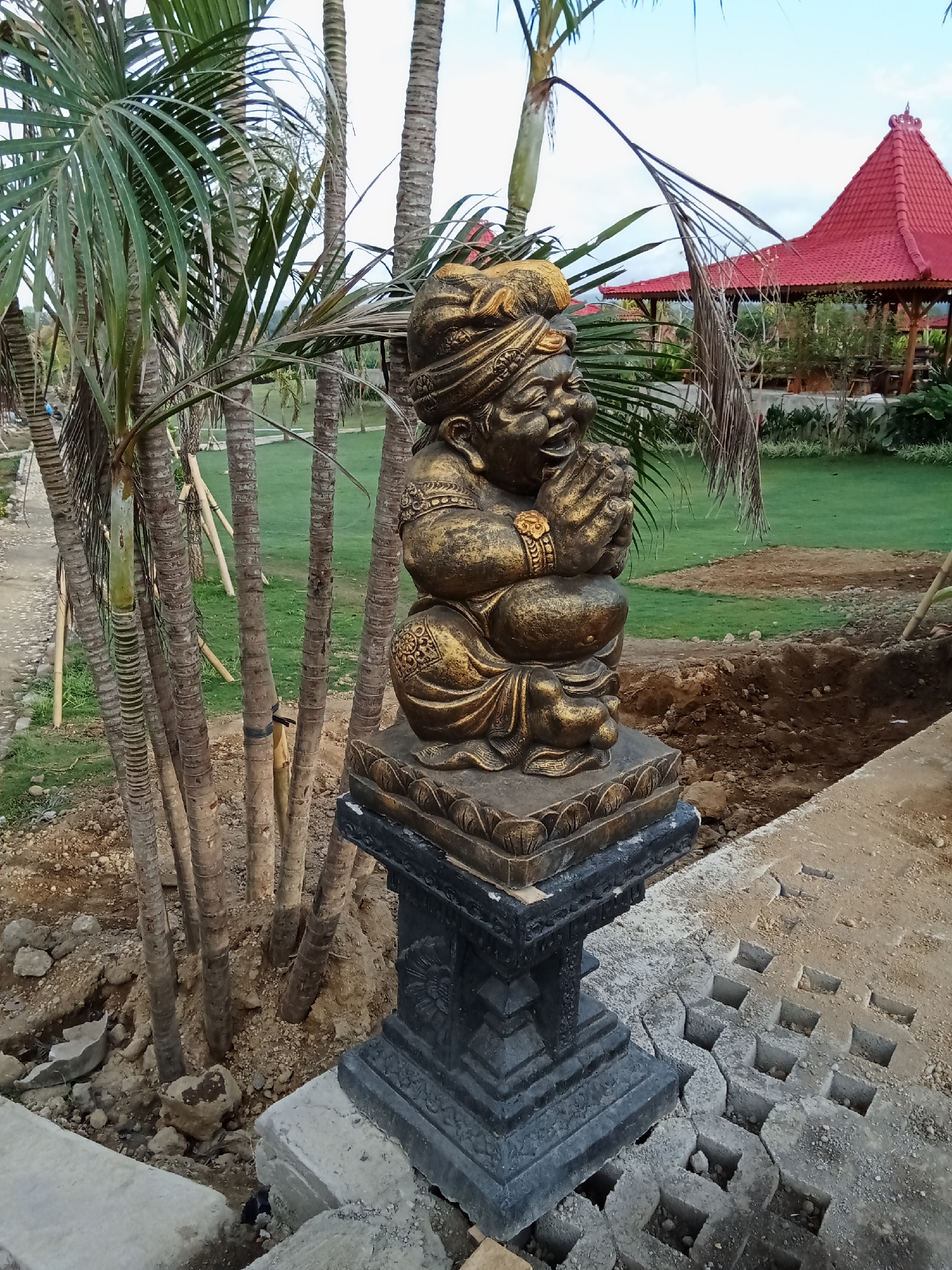 Golden devotional statue in Selemadeg Timur, Bali