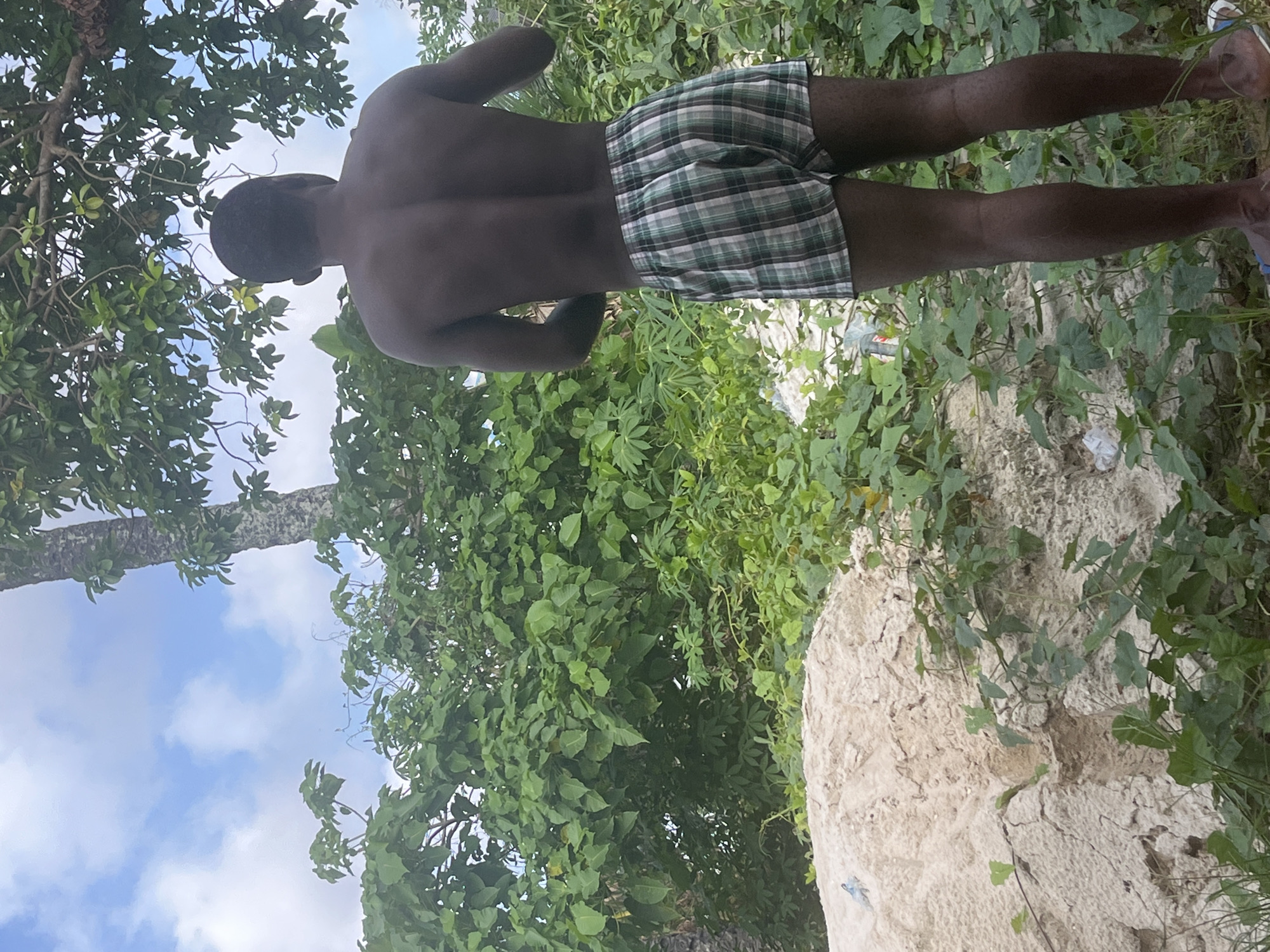 Man spotted outdoors among tropical vegetation in Ikot Ekpene