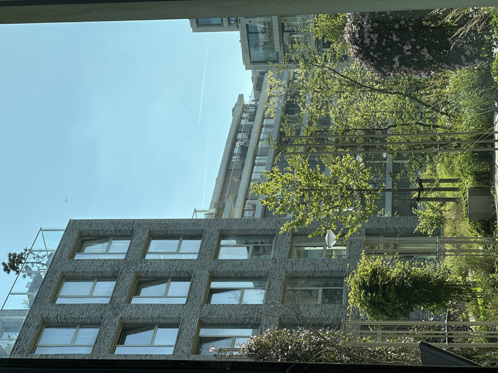 Amsterdam resident documents sunny urban architecture and digital display