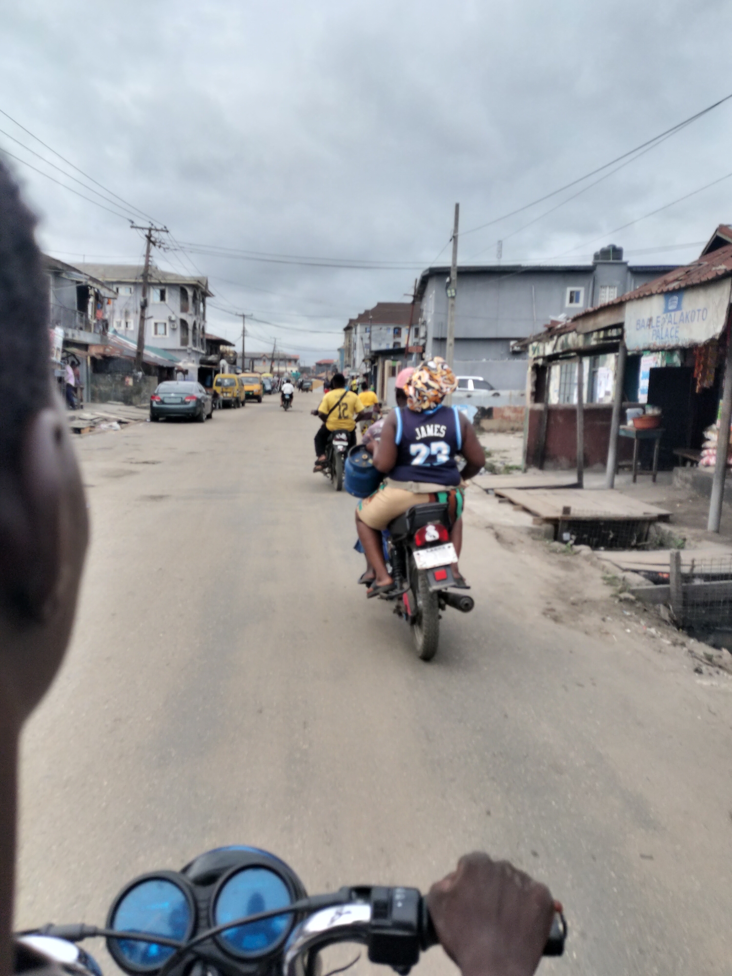 Motorcycle street scene captured in Alaiyabiagba, Nigeria