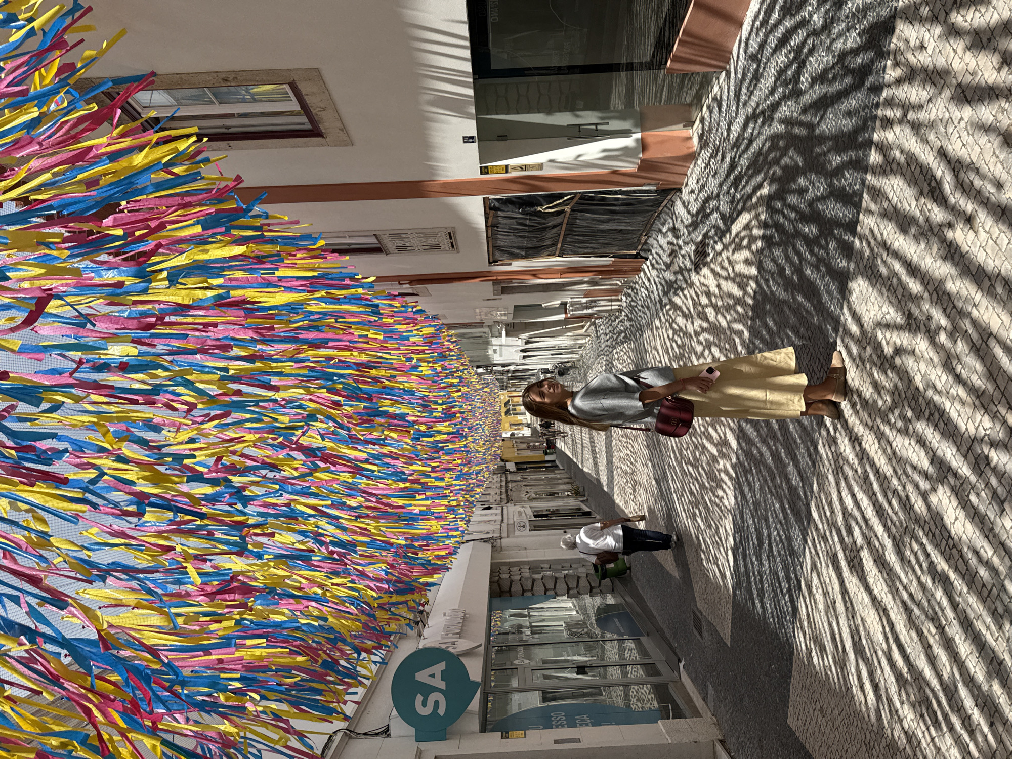 Street festival atmosphere in Torres Vedras on a summer afternoon