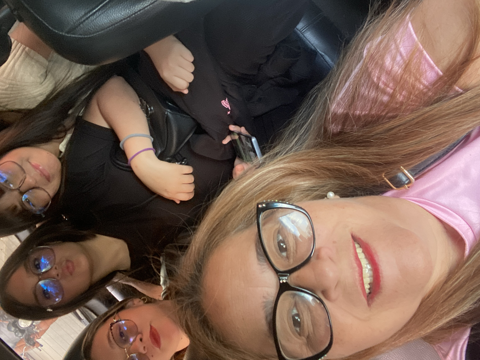 Group selfie session in a car on Turmero streets