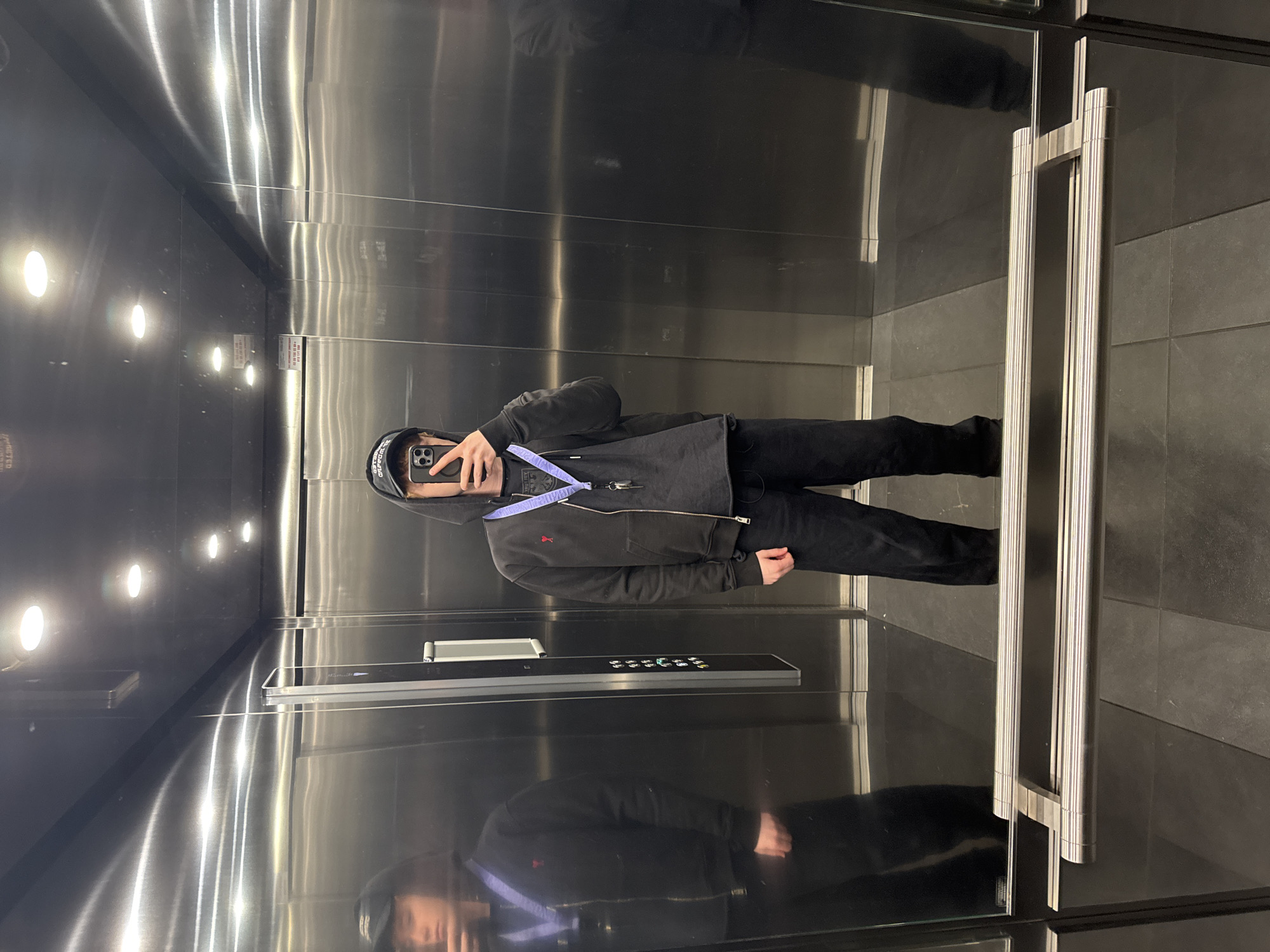 Person takes elevator selfies in Warsaw building