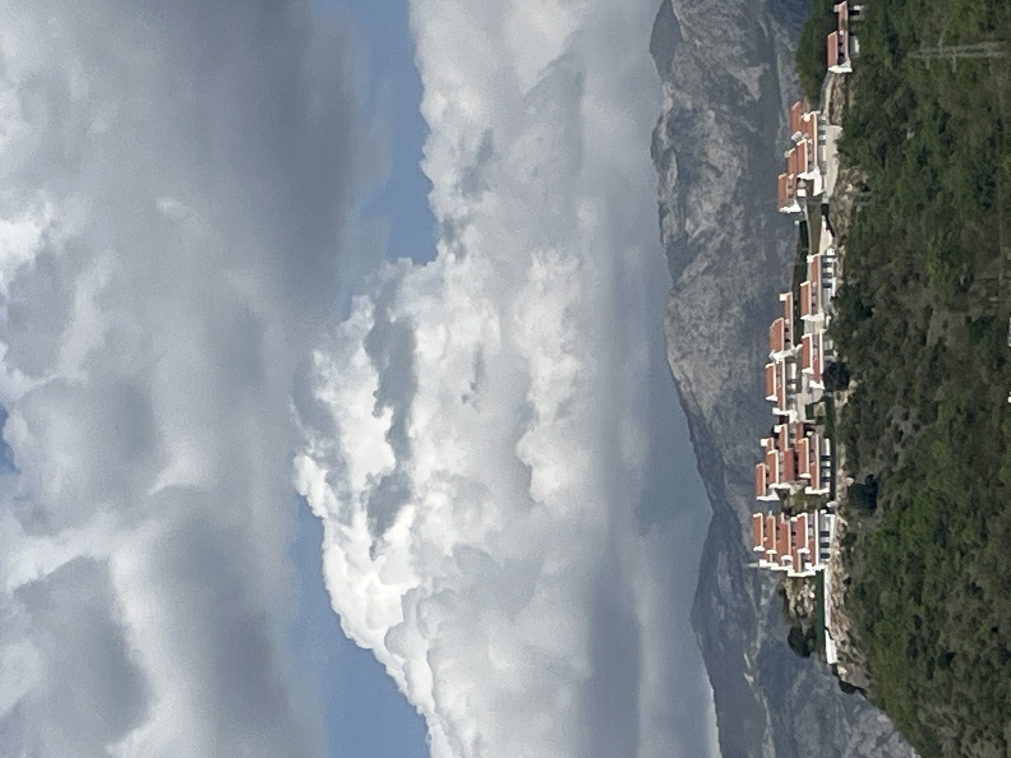Hillside residential scene documented in Blizikuće, Montenegro