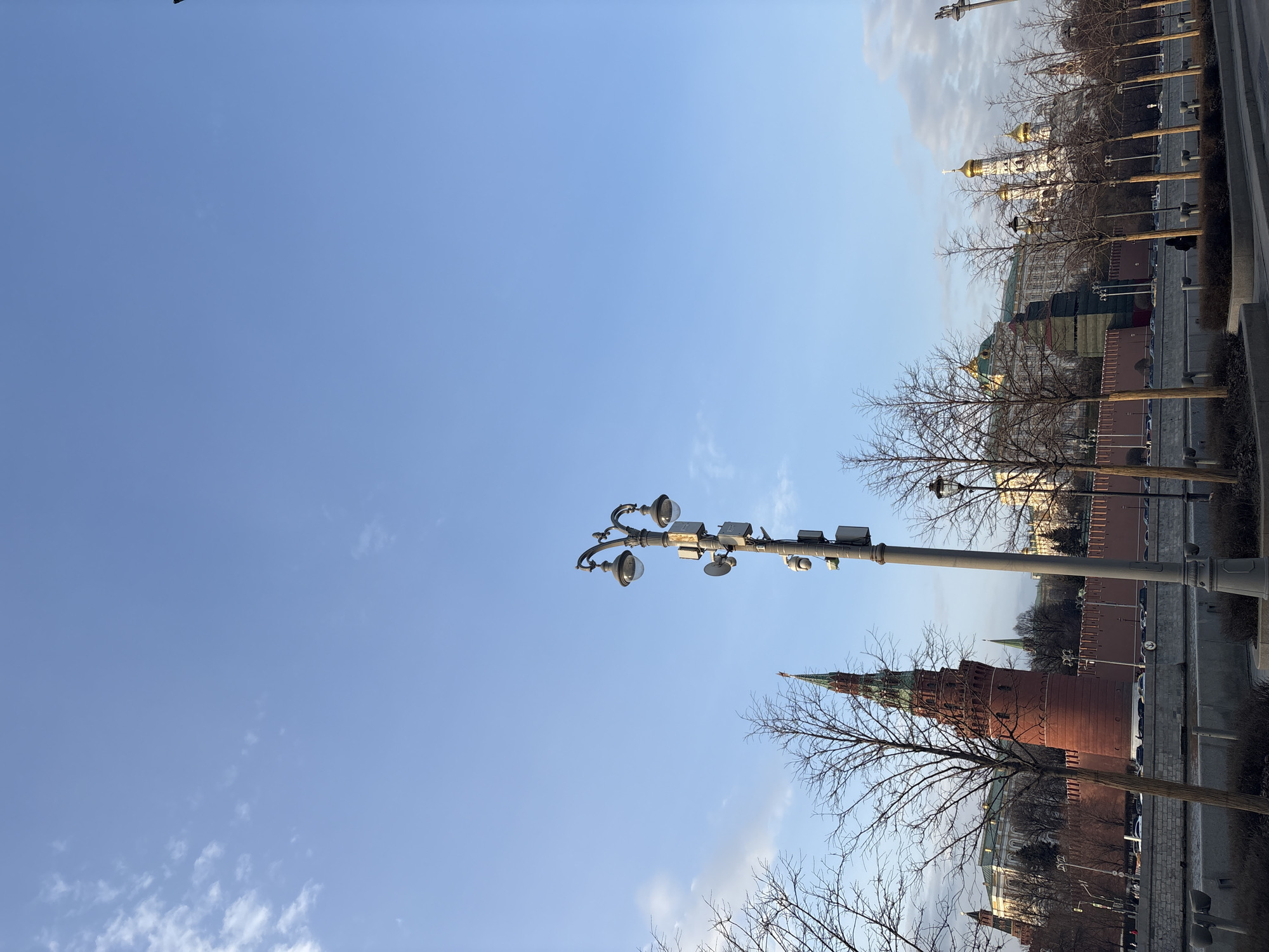 Tourists document Moscow Kremlin views during afternoon sightseeing