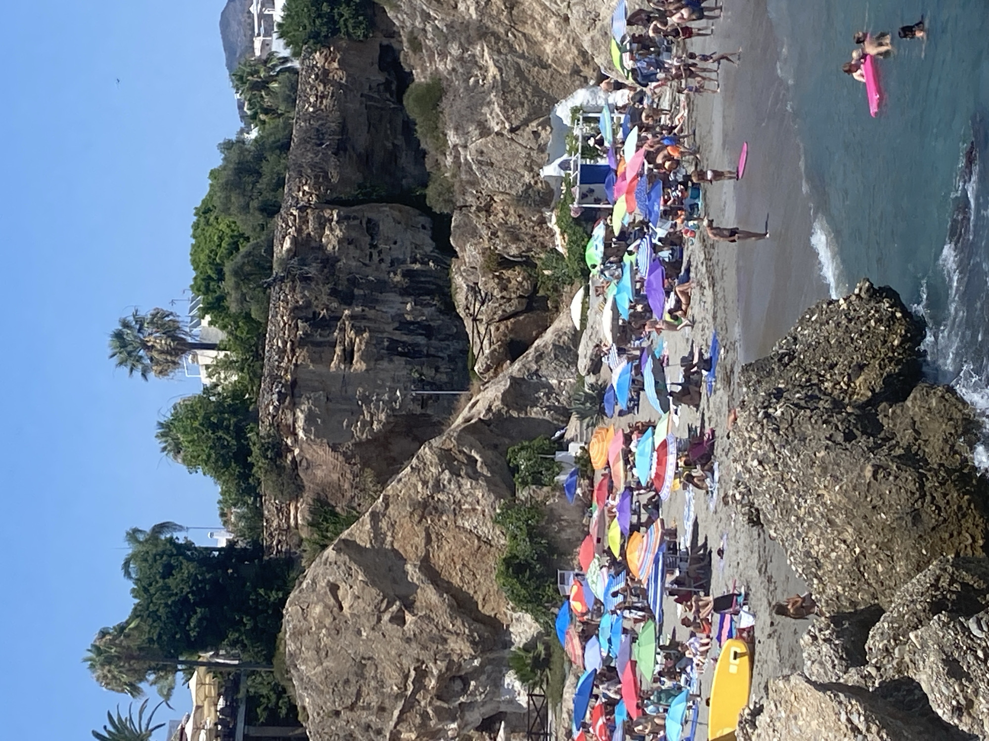 Nerja's beaches and seafront buzzing on a sunny July afternoon