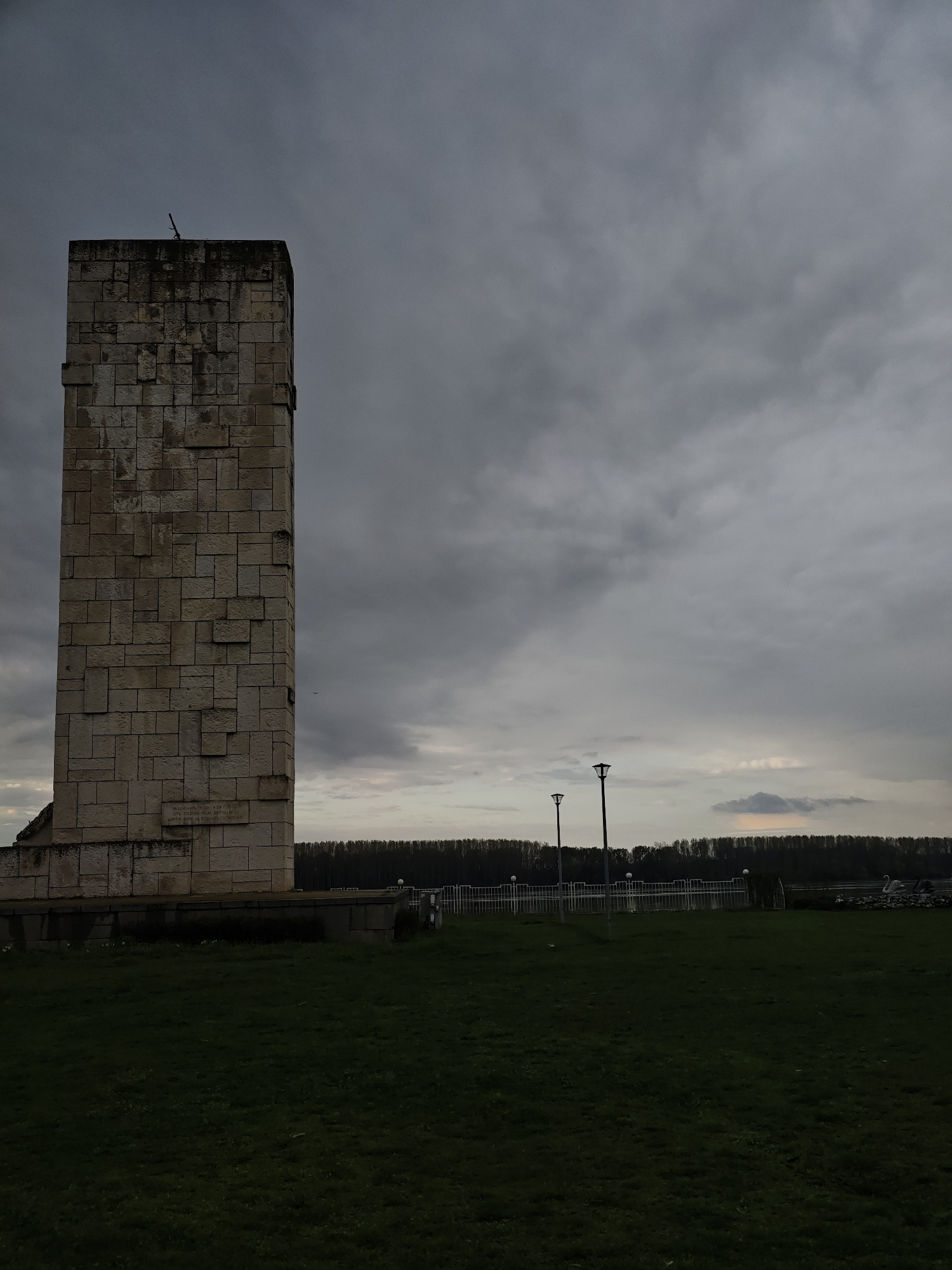 Stone monument observed in Kozloduy, Bulgaria under cloudy skies