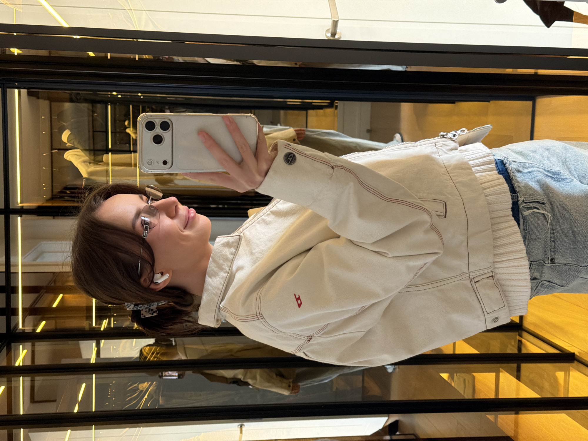 Woman takes selfie in Moscow retail store