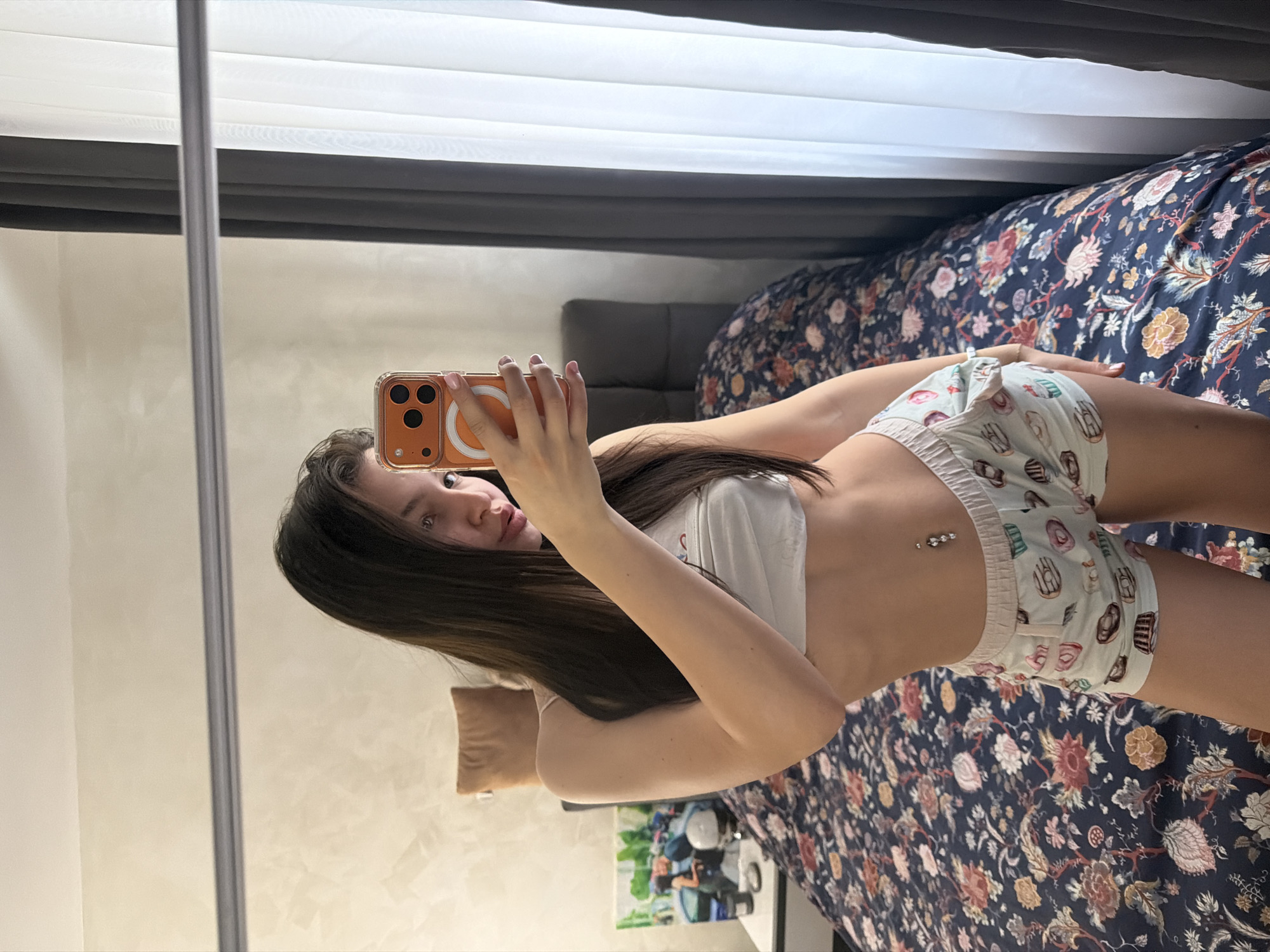 Woman takes multiple bedroom selfies in Pernik, Bulgaria