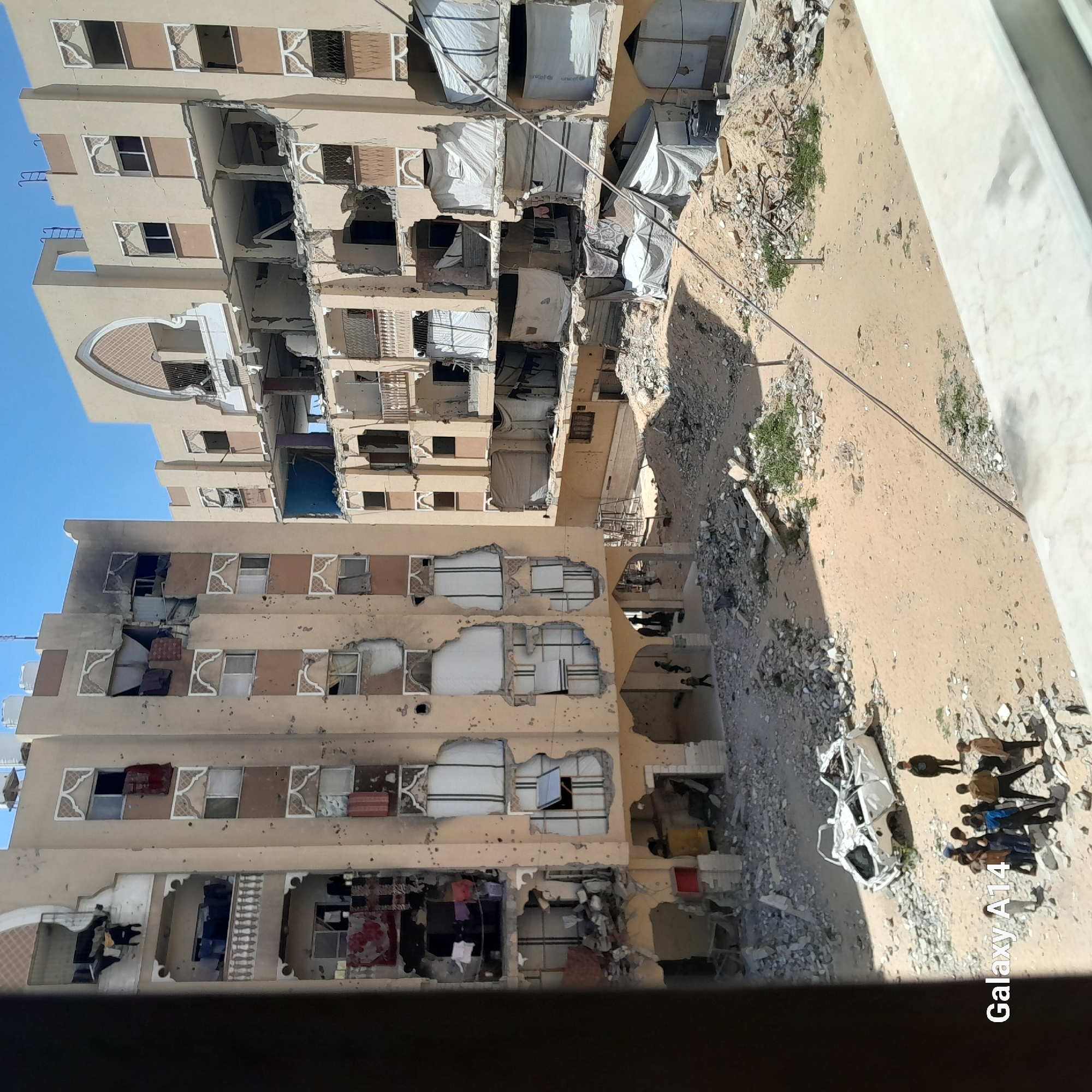 Aerial views document extensive damage, refugee camps in Khan Yunis