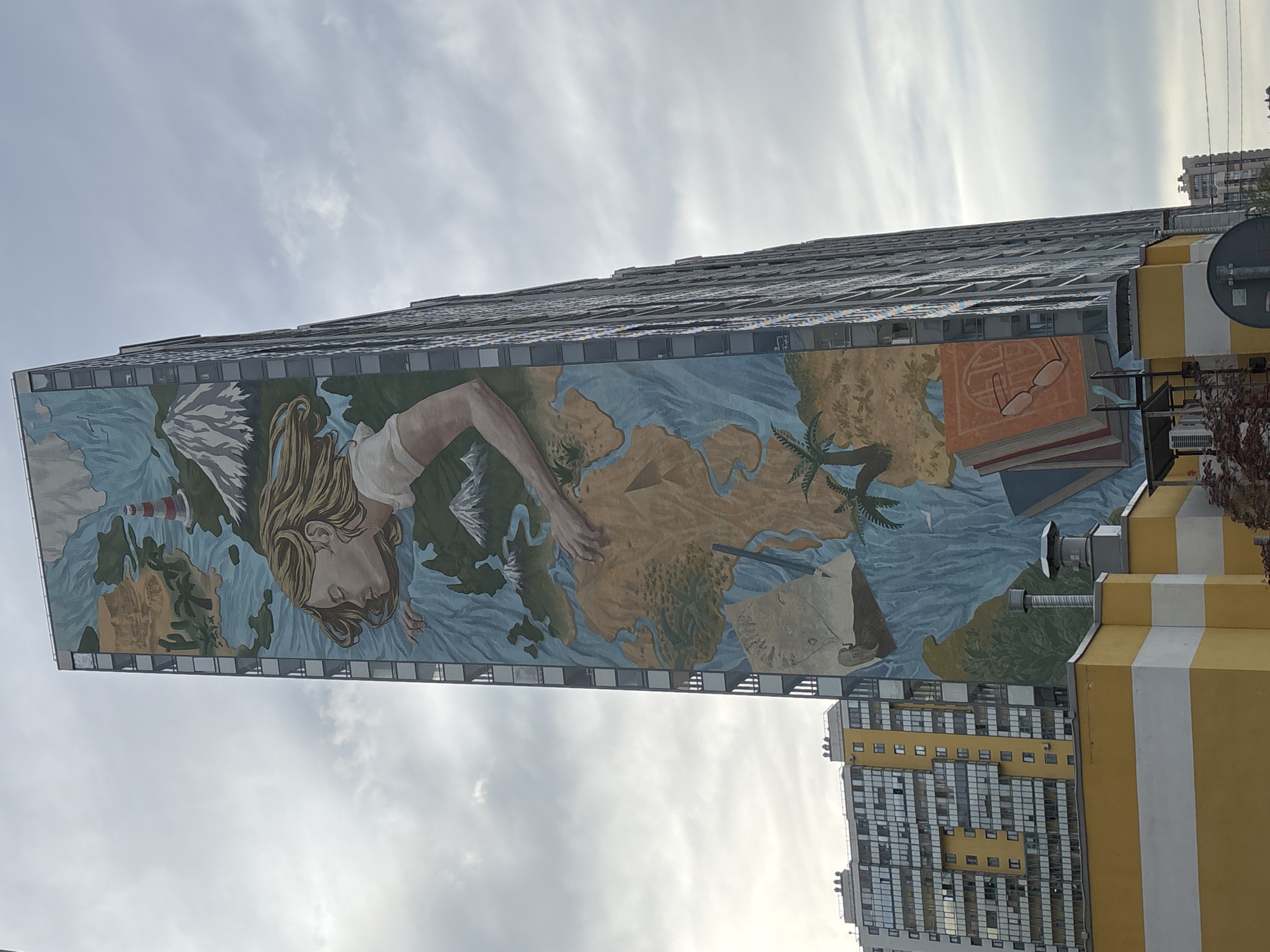 Urban murals and industrial landmarks documented in afternoon survey