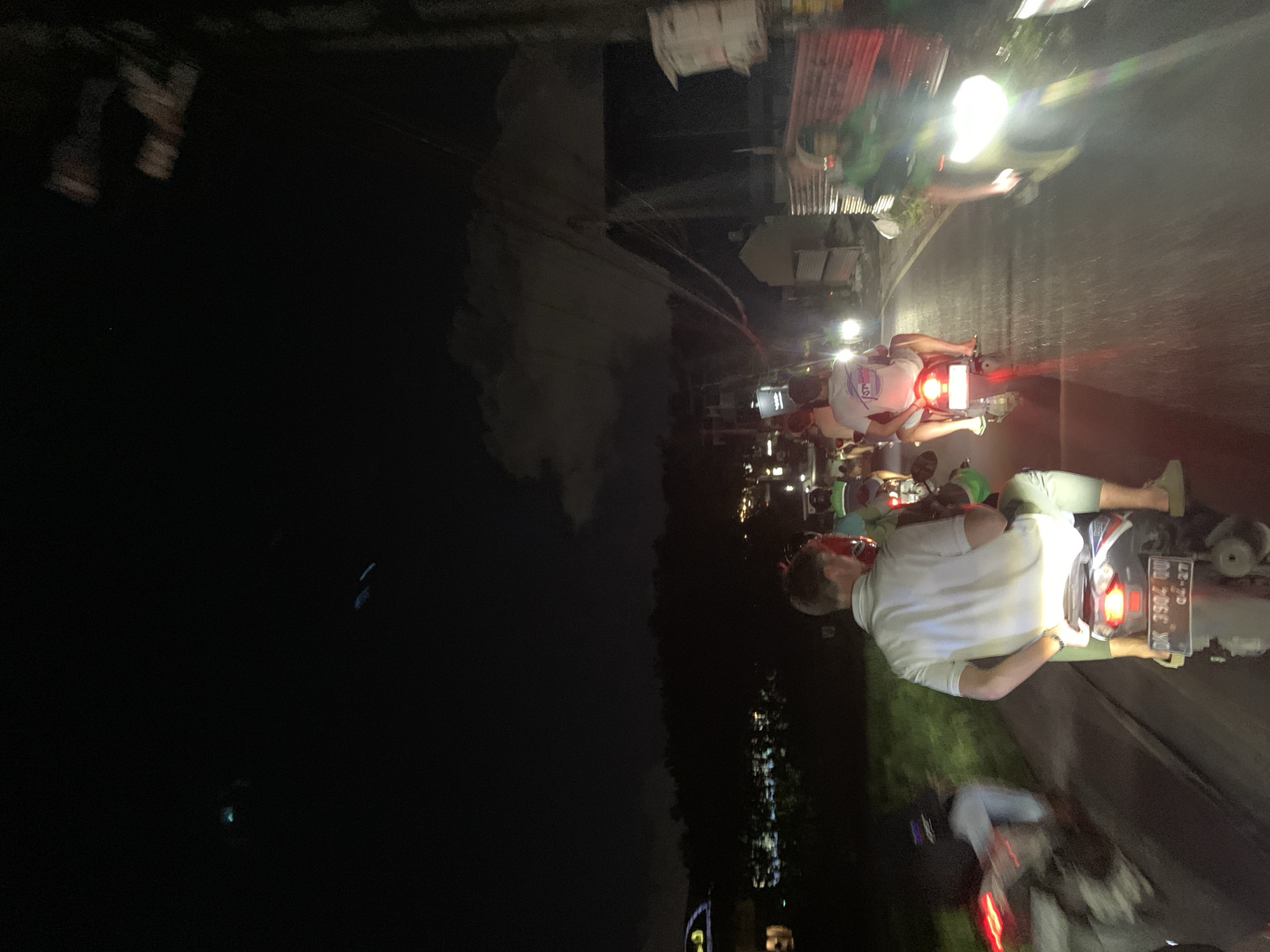 Nighttime motorcycle traffic captured in North Kuta, Indonesia