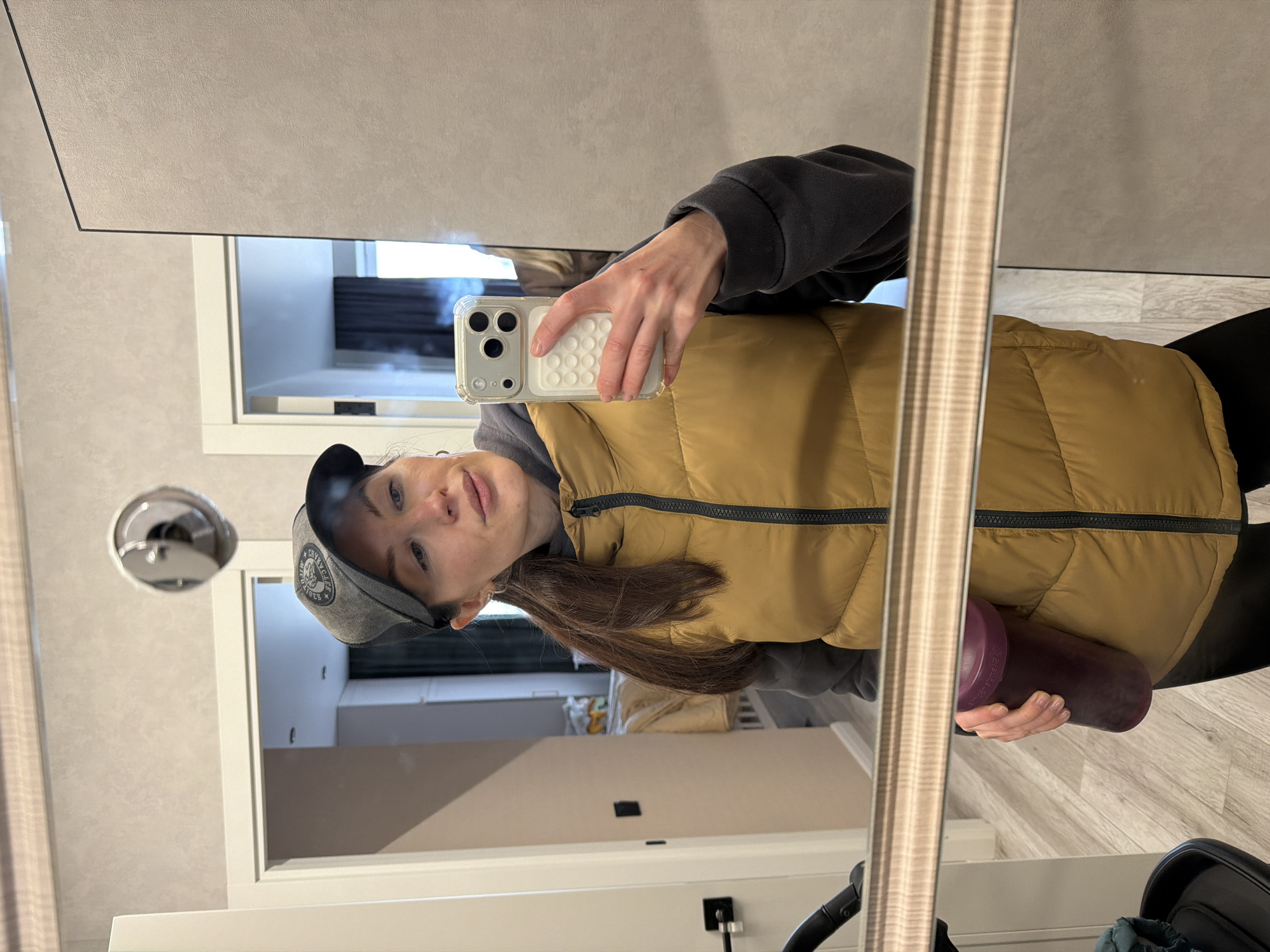Woman takes mirror selfie in Perm, Russia