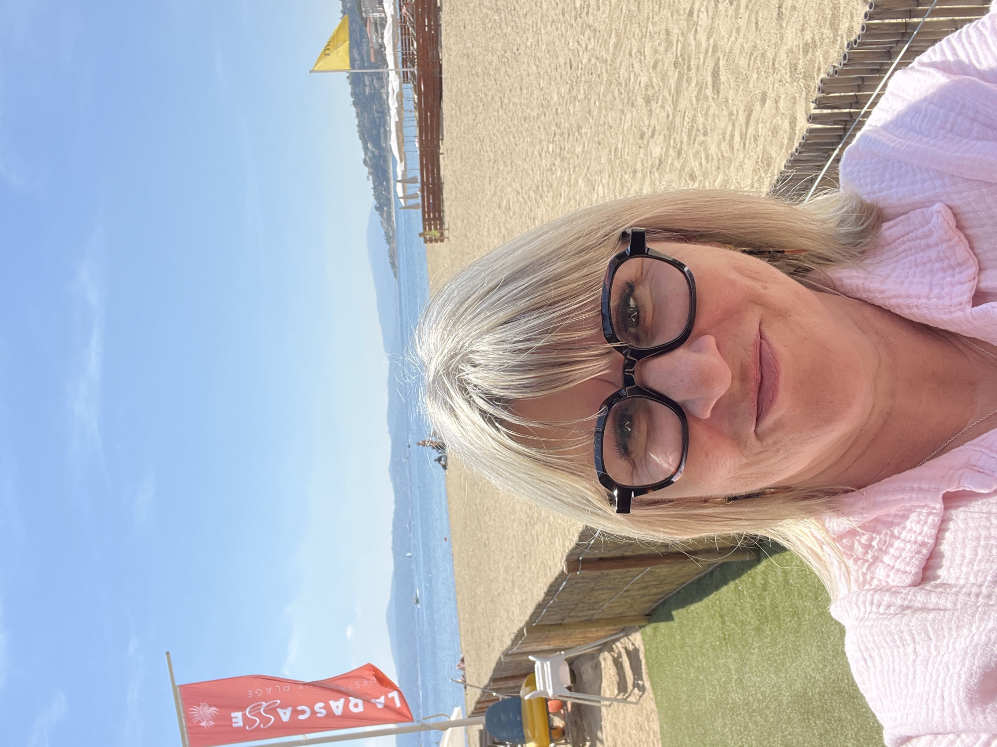Woman photographed at beach, restaurant, indoor location in Sainte-Maxime