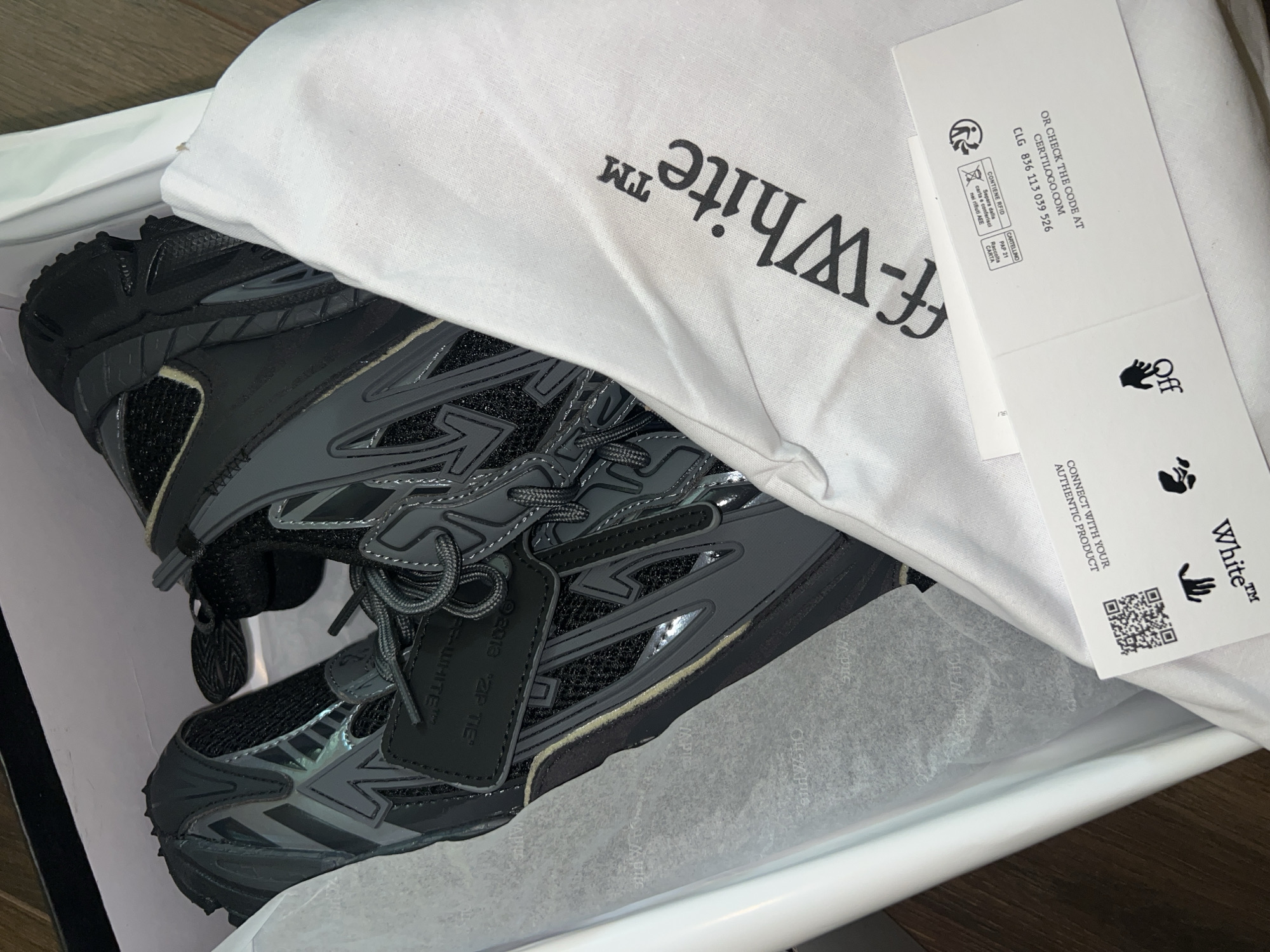 Person documents Off-White sneaker collection in Bulgarian mirror selfies