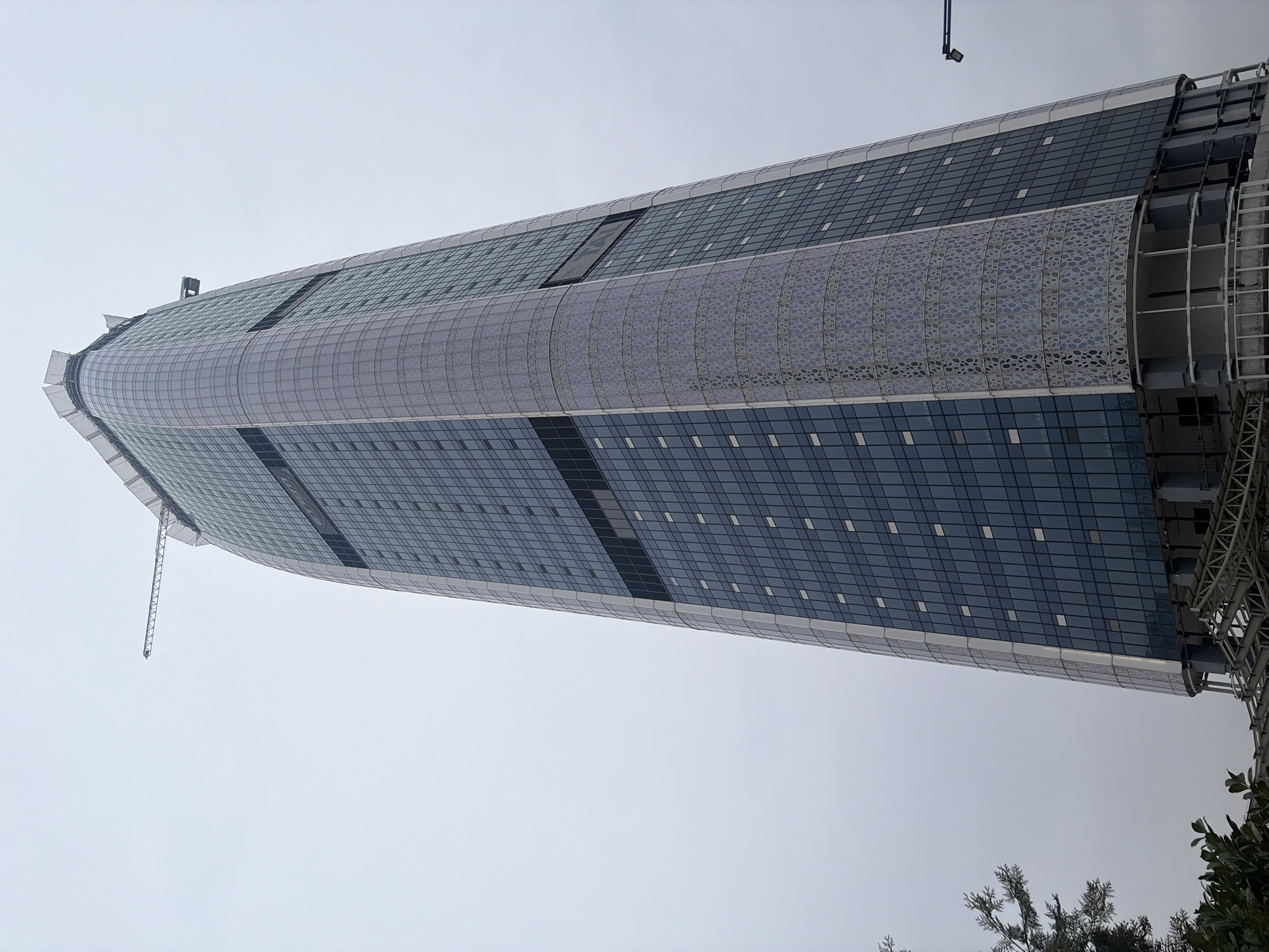 Incomplete Capital Fort skyscraper photographed from below in Sofia