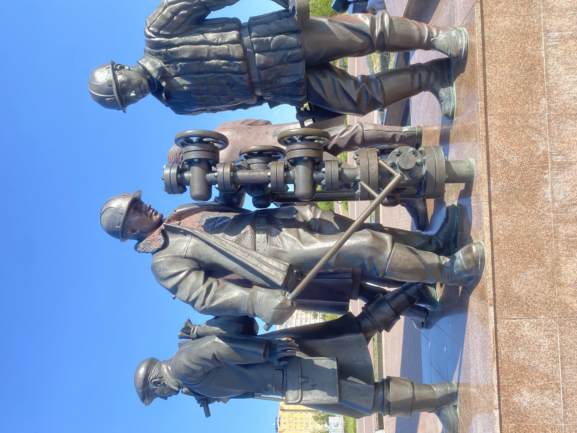 Bronze oil workers monument in Russia's petroleum city Nefteyugansk