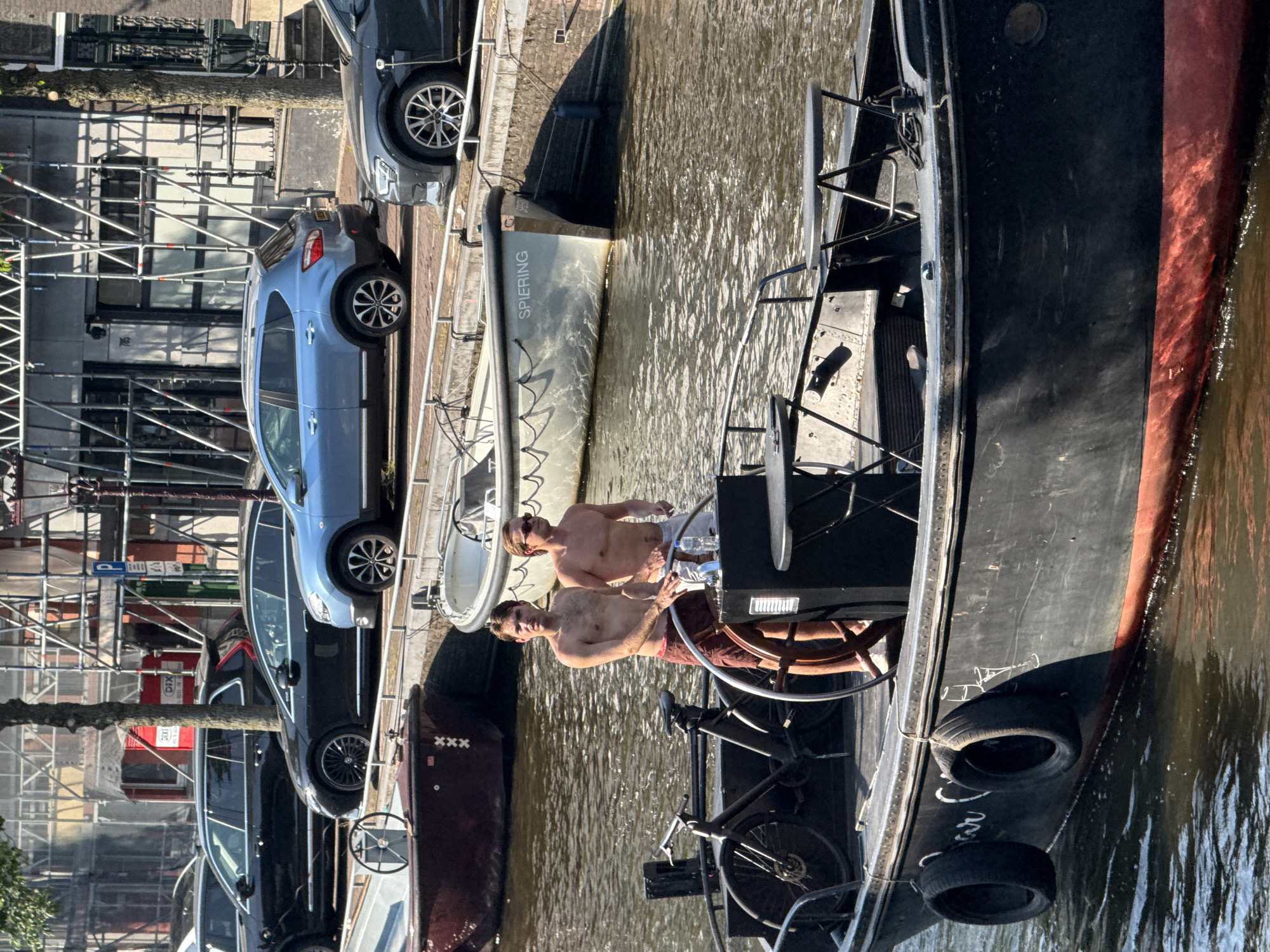 Sunny afternoon on Amsterdam's canals and streets
