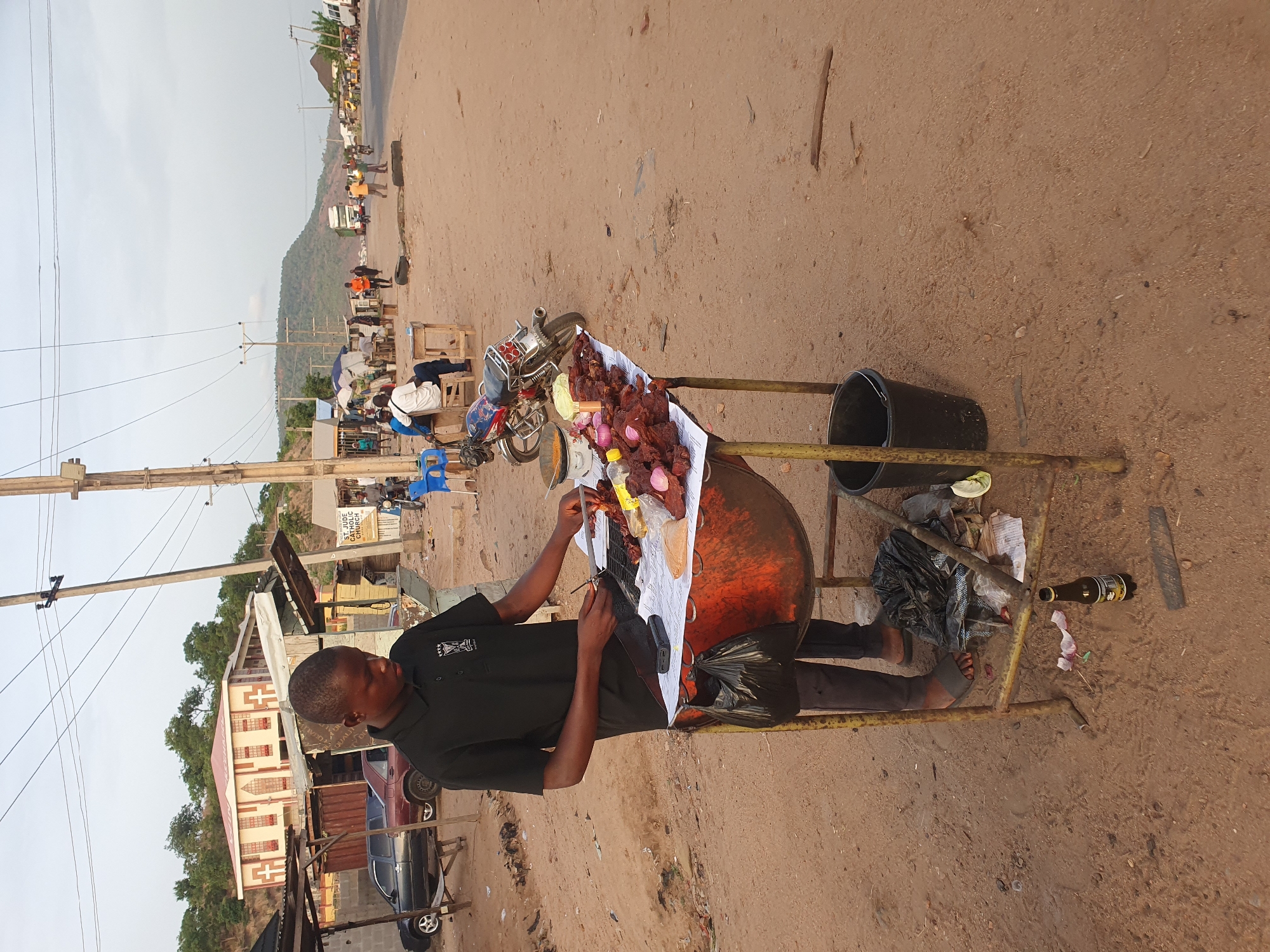 Daily street life documented across Lokoja Nigeria April afternoon