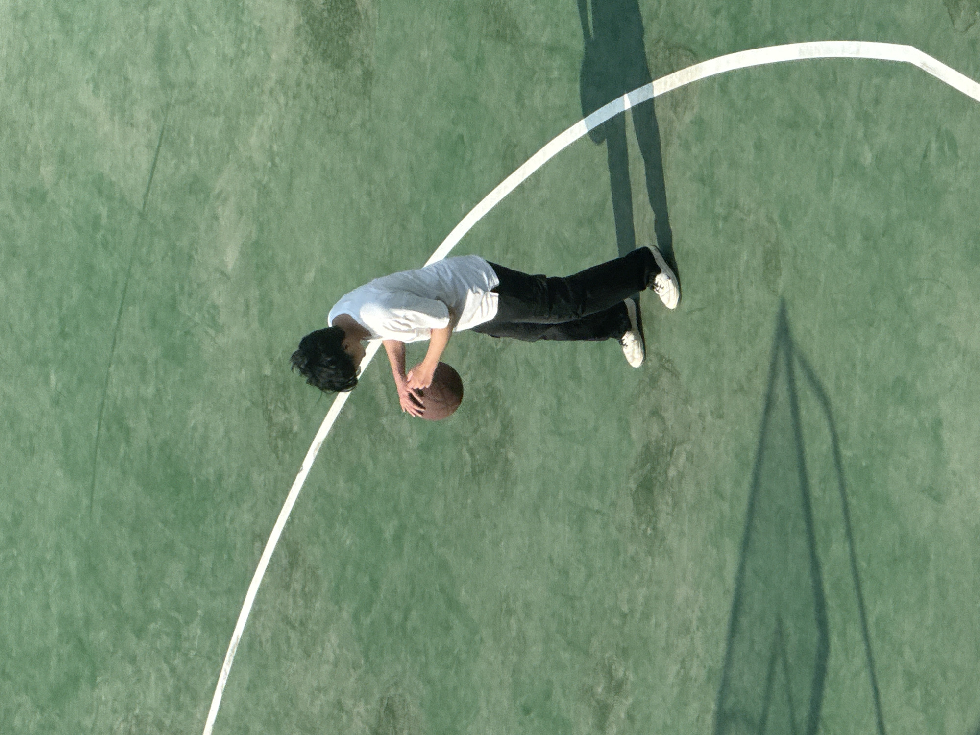 Morning basketball session at outdoor court in Beijing