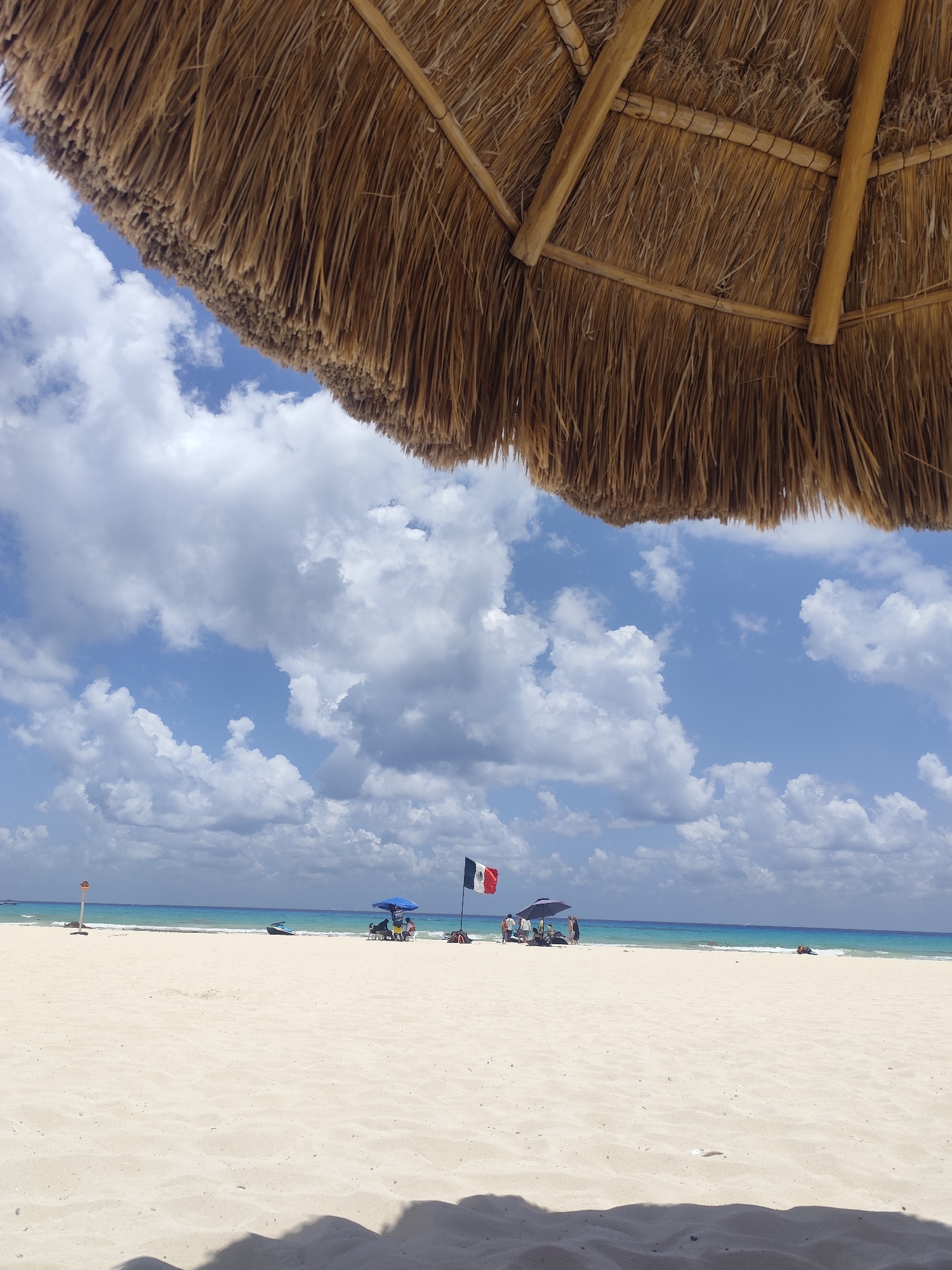 Beachgoer captures palapa view at Playa del Carmen