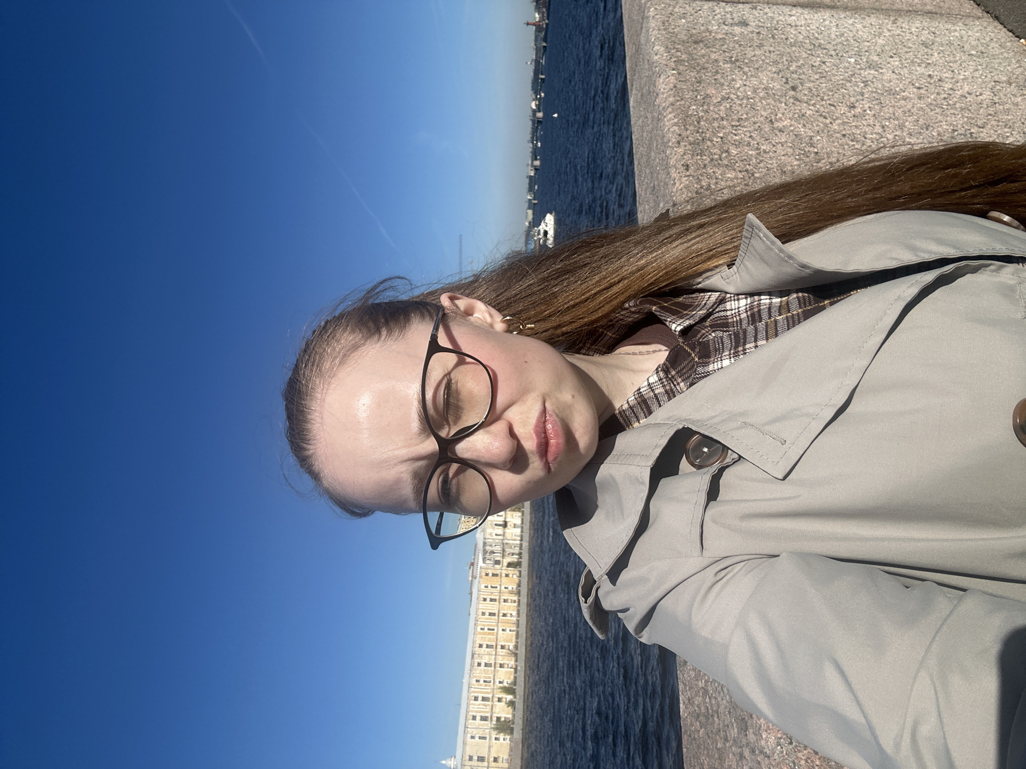 Tourist documents sunny afternoon sightseeing tour through historic Saint Petersburg