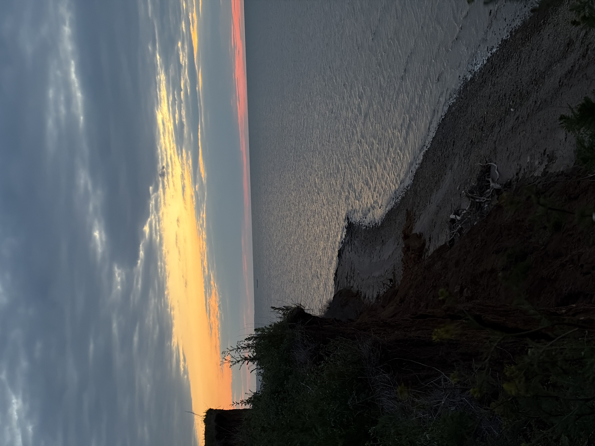 Sunset observed over coastal waters near Port-Katon, Russia