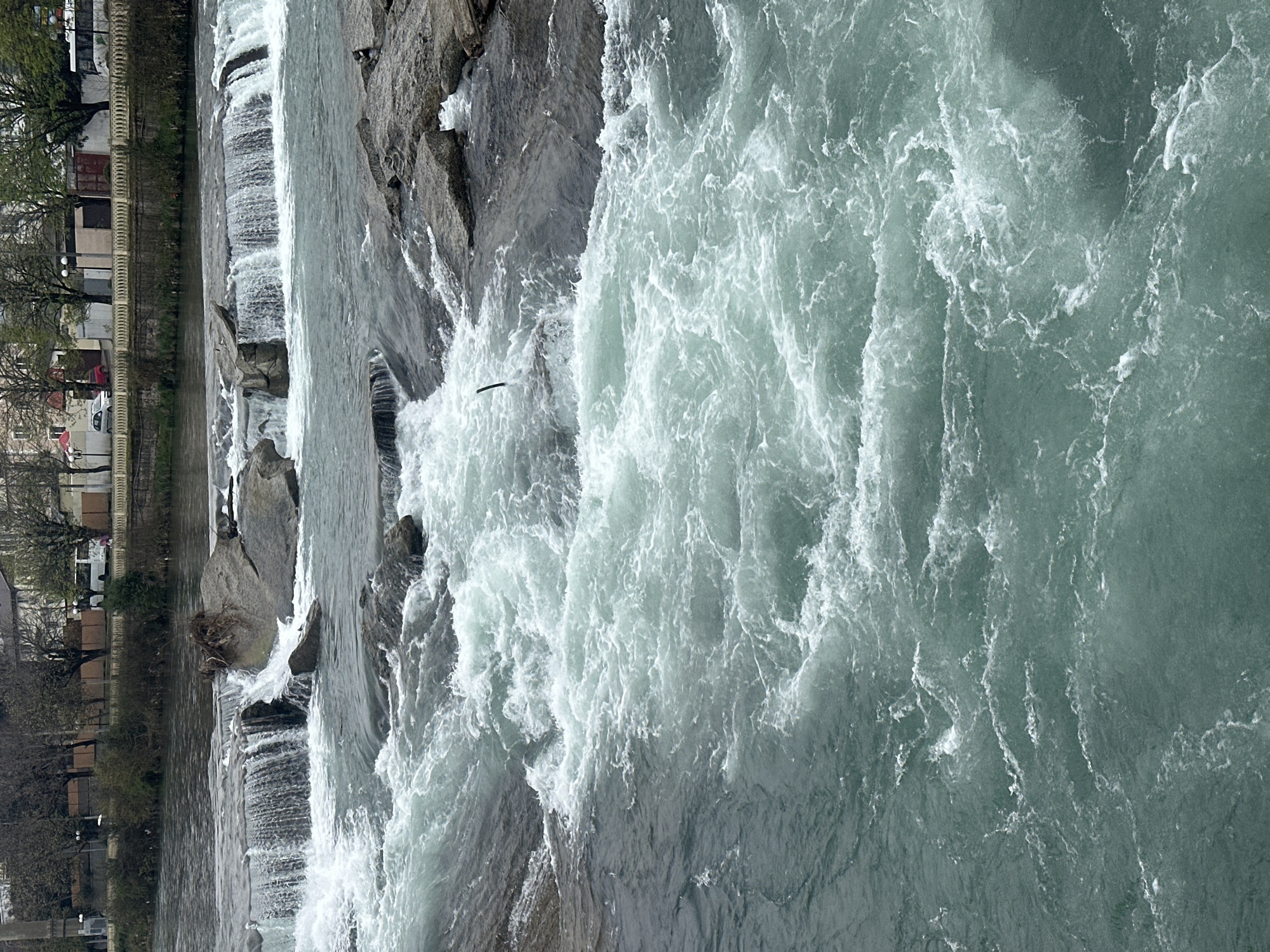 Turbulent river flows through Sochi with strong white water currents