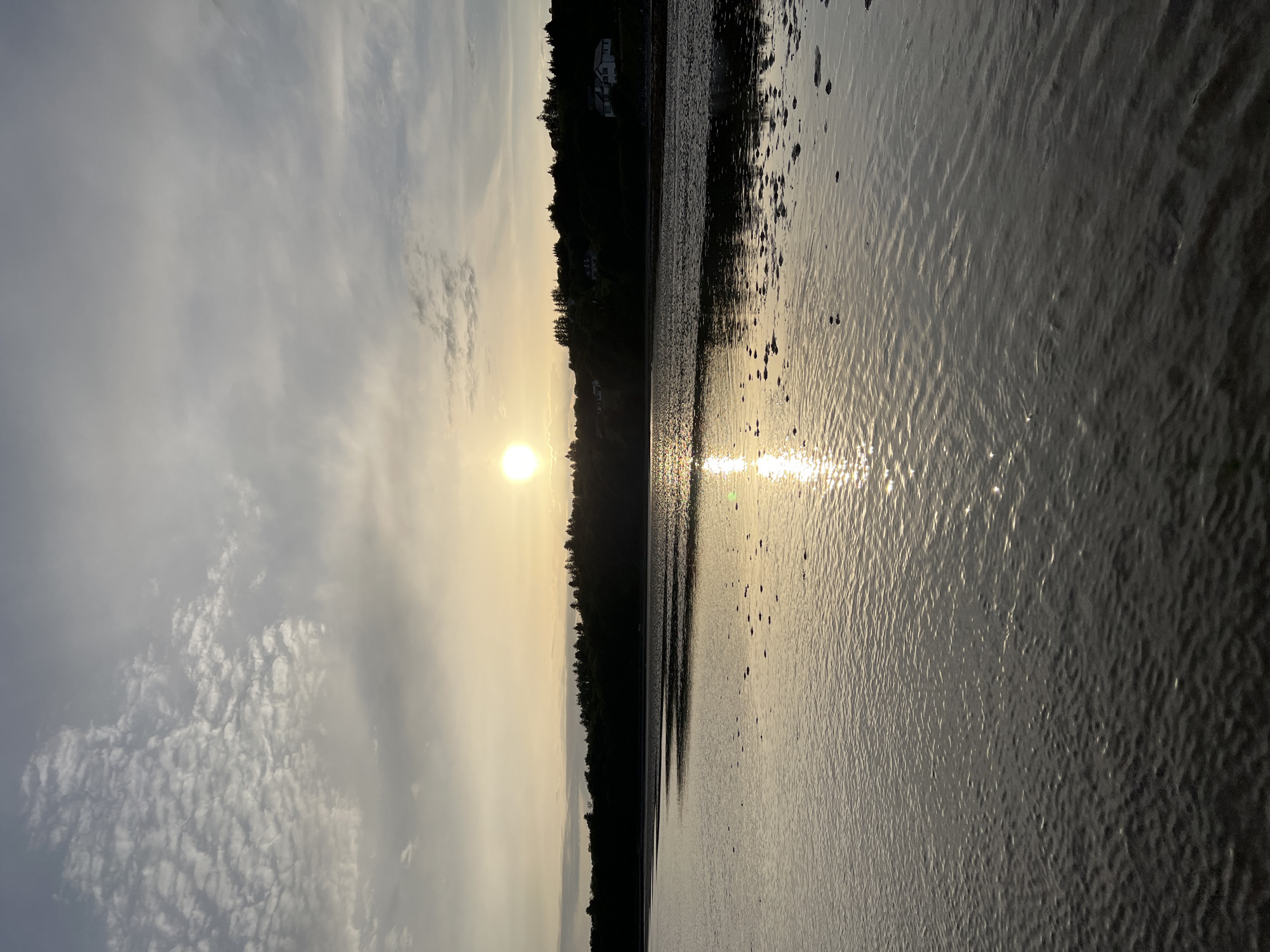 Sunset over a tidal estuary in Mountcharles, Ireland