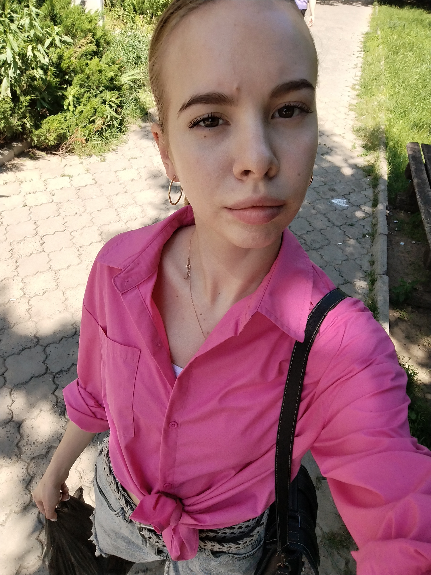 Outfit selfies and an apartment building, same afternoon