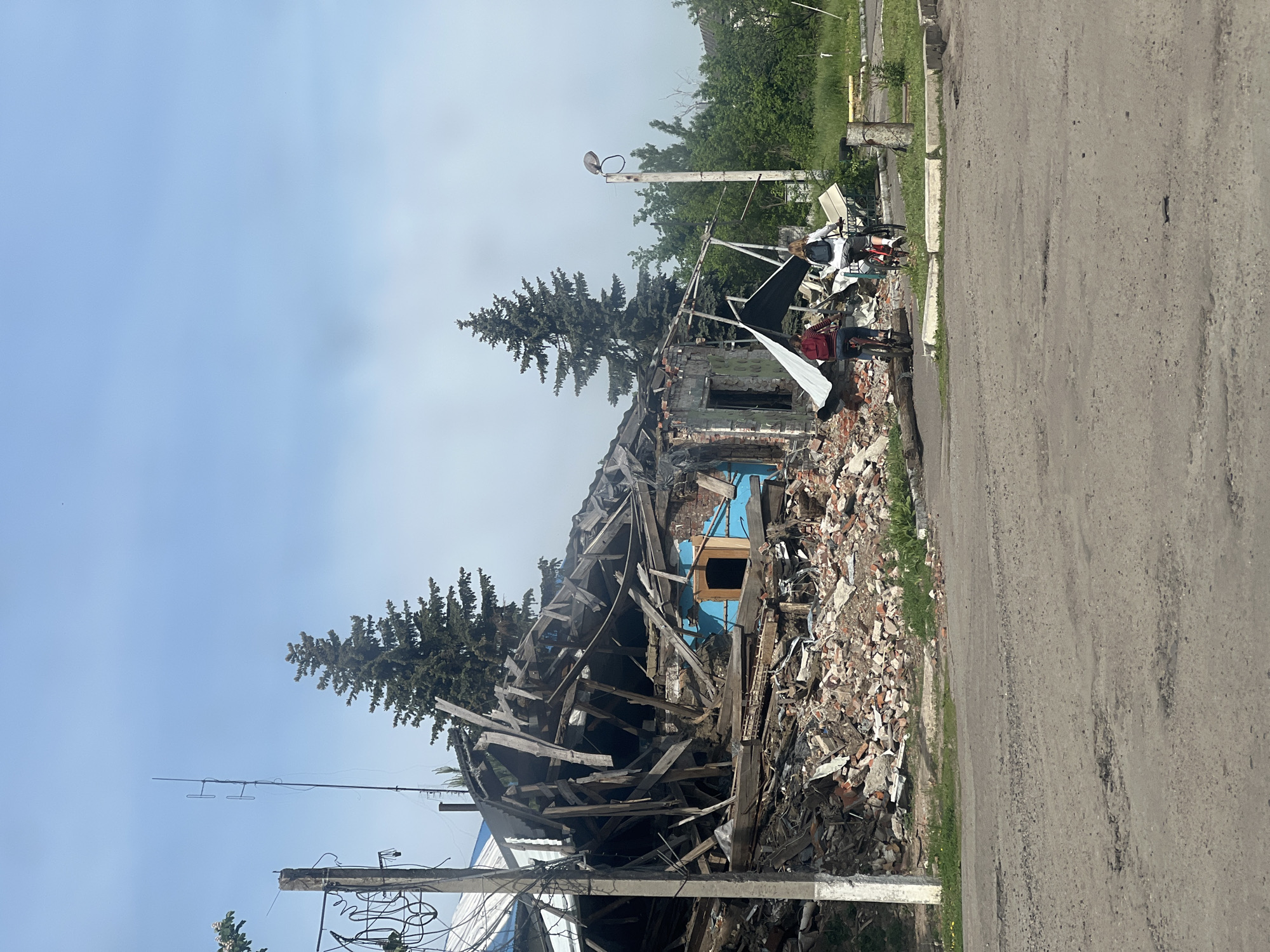 Damaged building with rubble observed in Zolochiv, Ukraine